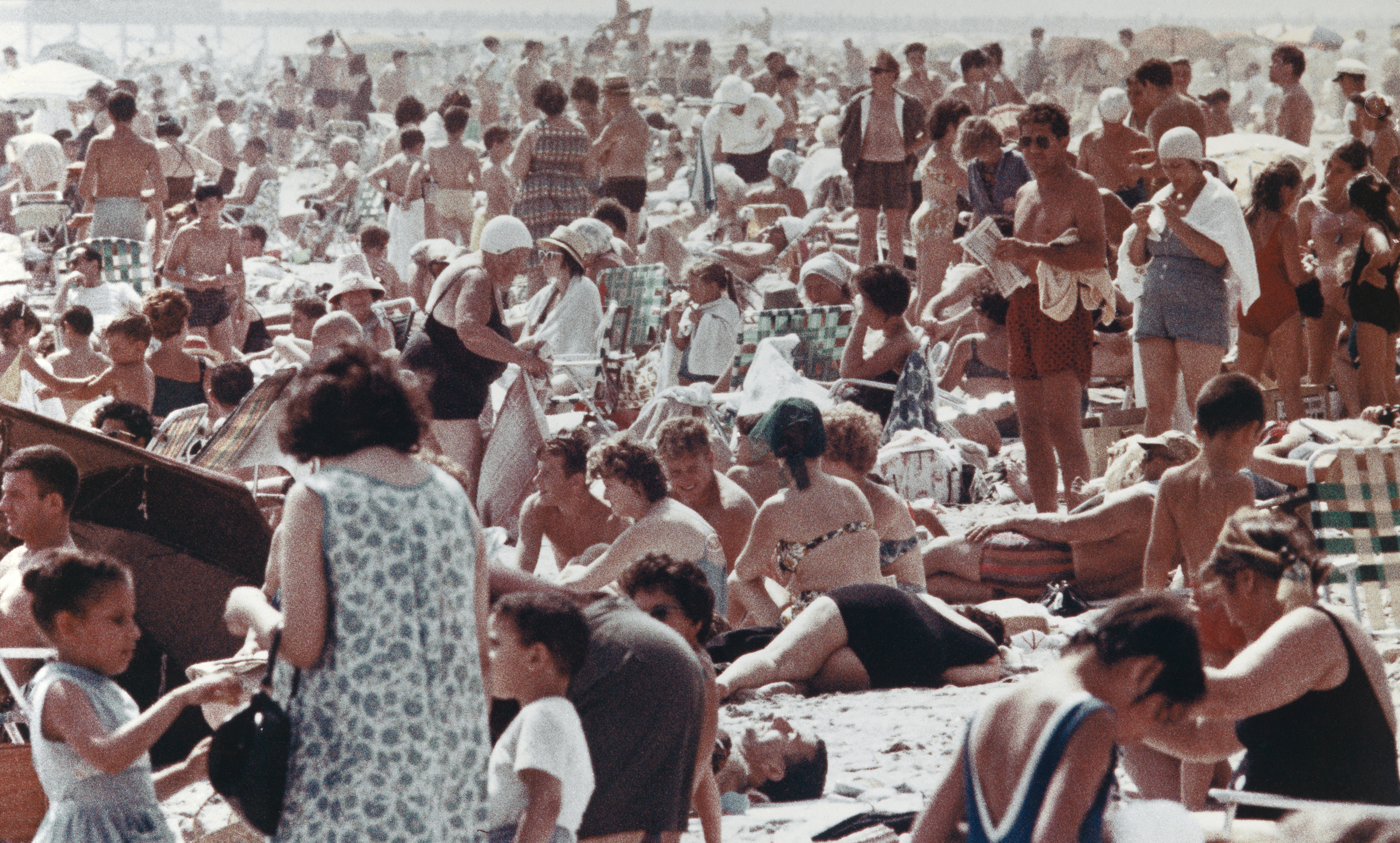 Rose's photographs showcase the rich mix of races, ethnicities, sexualities, and body types on display on the sandy landscape of Coney Island—described by Aletti as “a place where privacy is a state of mind.”