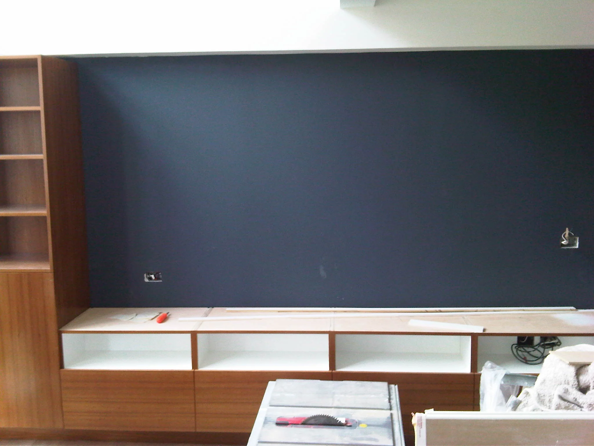 Living Room millwork install low cabinet.jpg