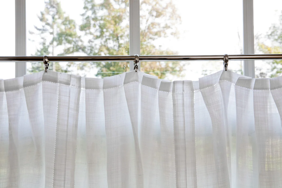 Six napkins sewn into one cafe curtain, pleats on header create more opacity for privacy