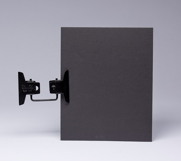 The Multi-Clip and black cardboard