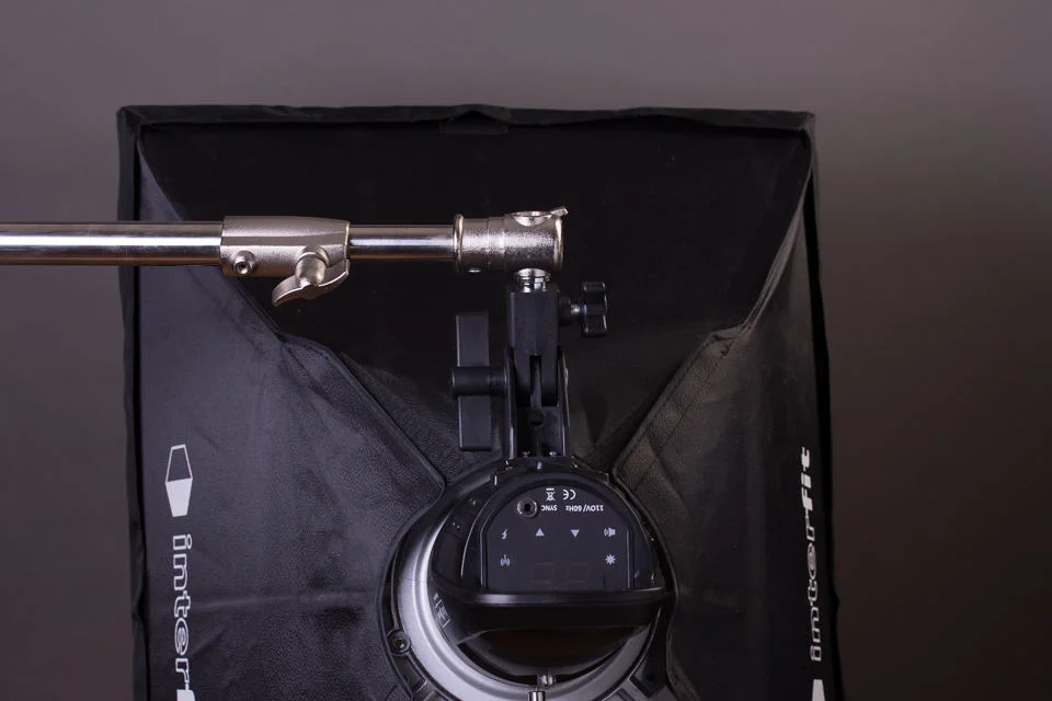 Being able to let the light hang down keeps it from wanting to spin around the boom arm