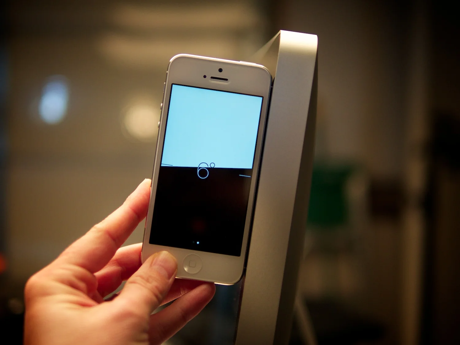 Compass app to the rescue! Just slide to the left from the compass screen to reveal the digital level.