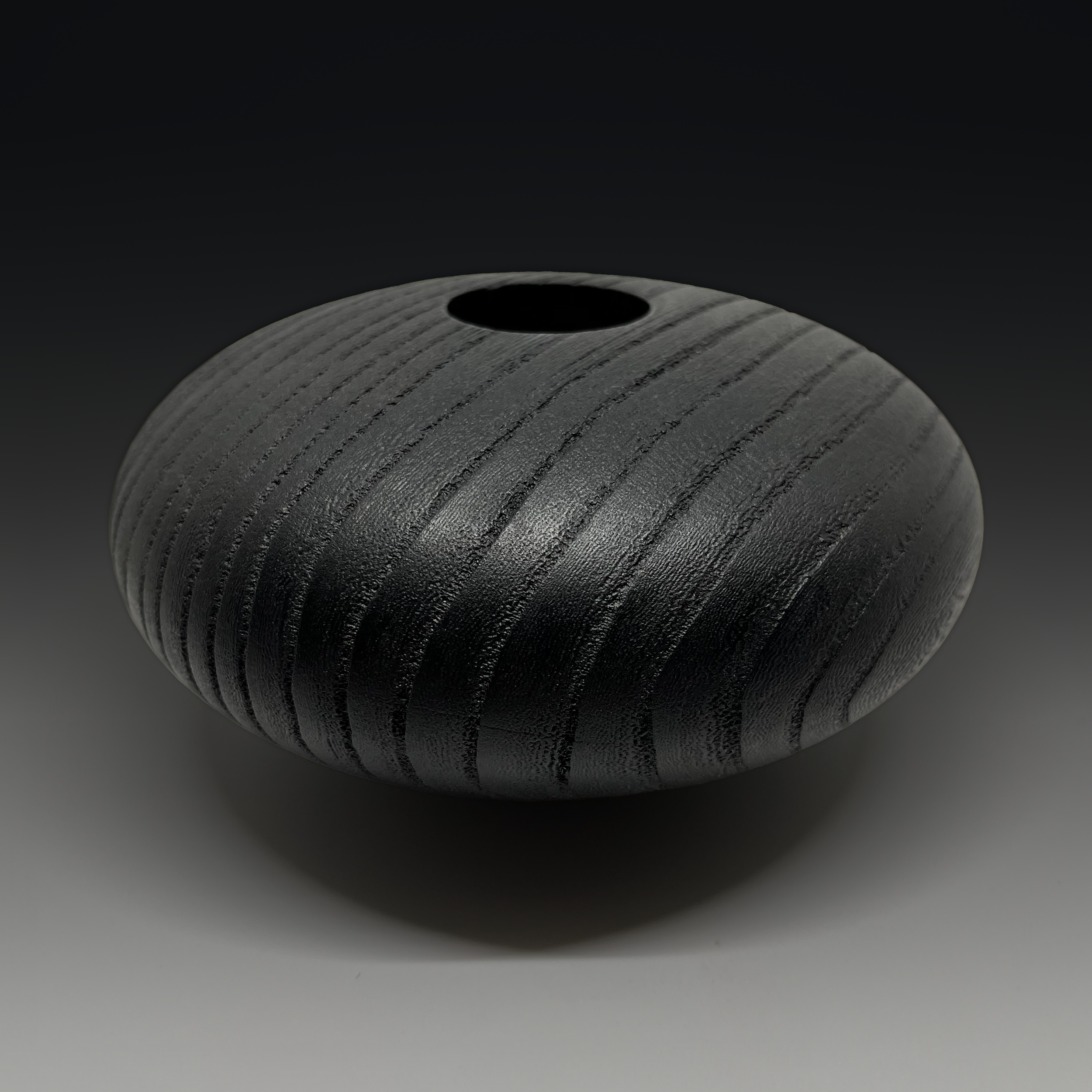 Carved and ebonized ash bowl