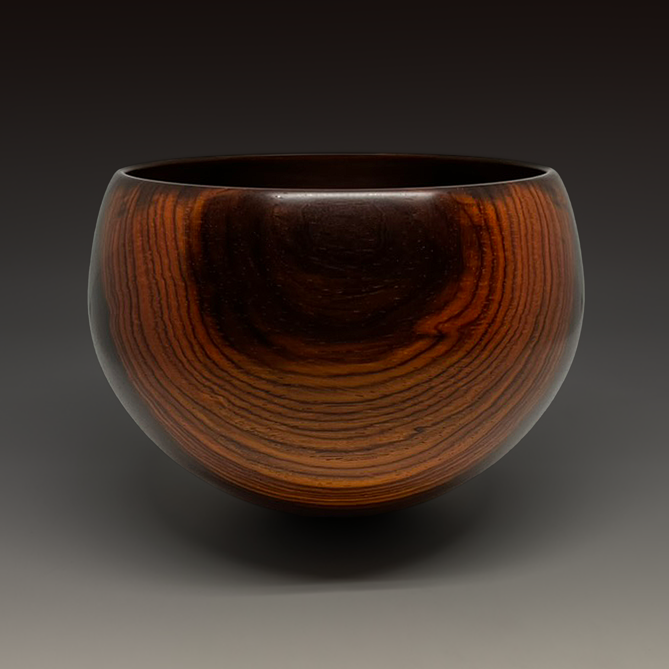 Turned cocobolo bowl with figured grain