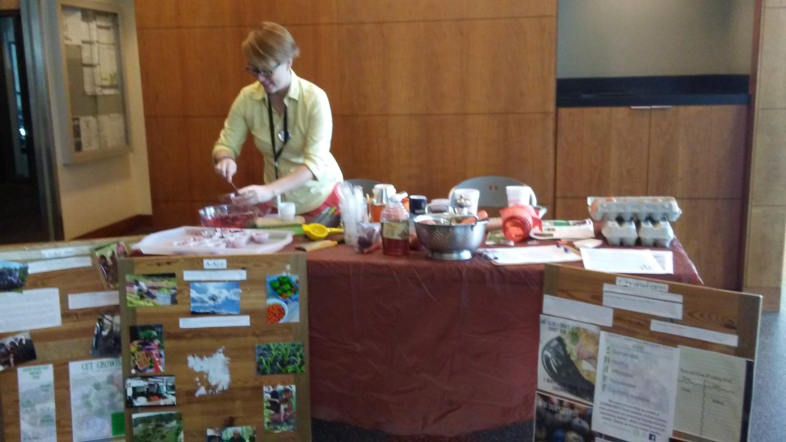 E.A.T. South Executive Director Beth Anne Dunagan serves up Rainbow Crunch Salad at a recent Wellness Fair.