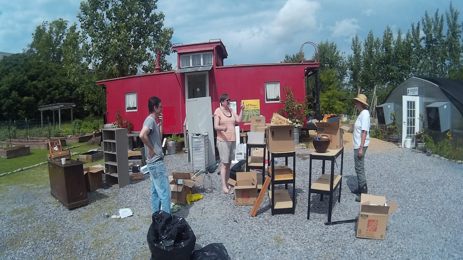 One pile for storage, one pile for the shipping container, one for garbage, and one for recycling
