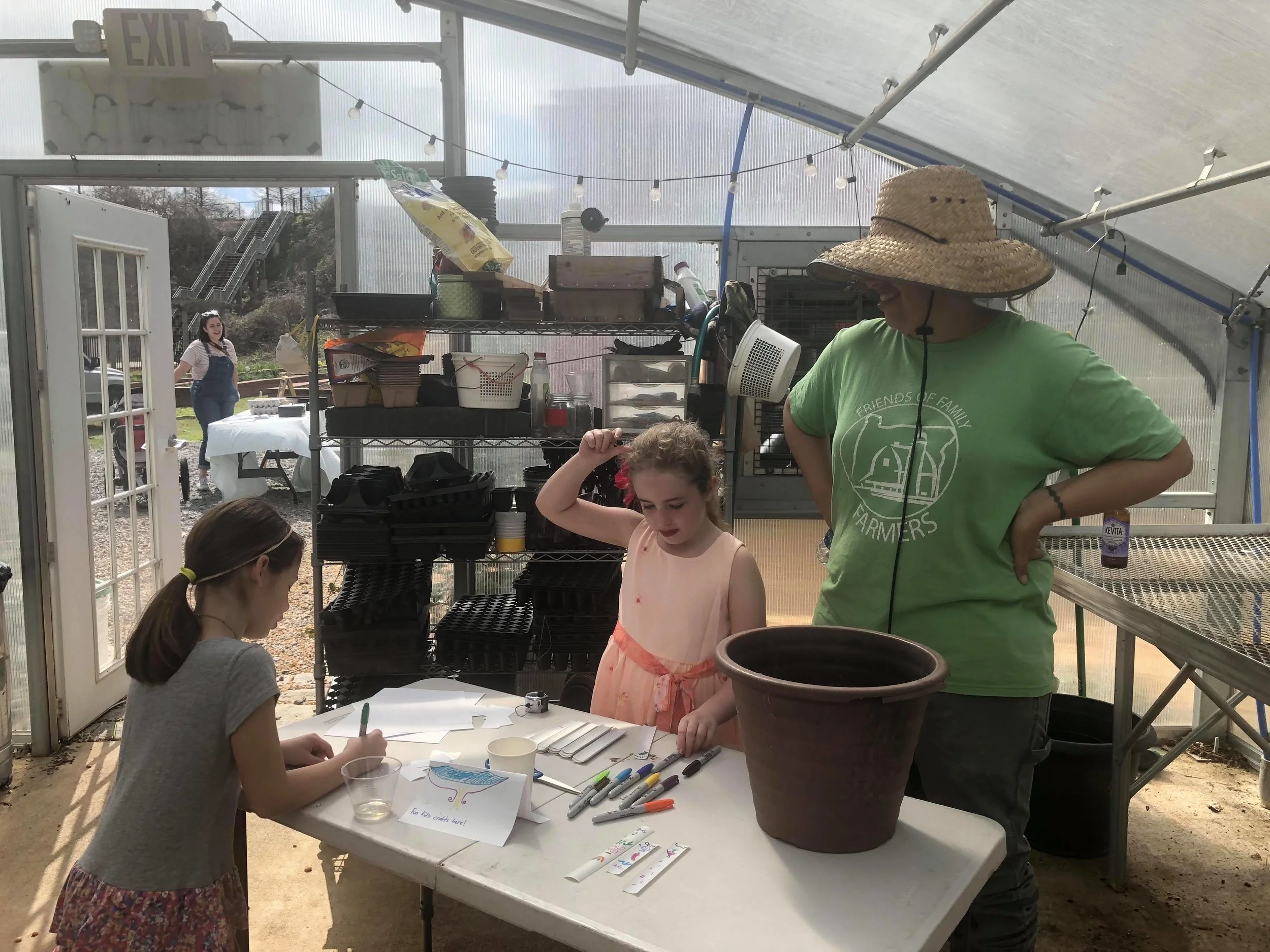 Making recycled plant tags and row markers.