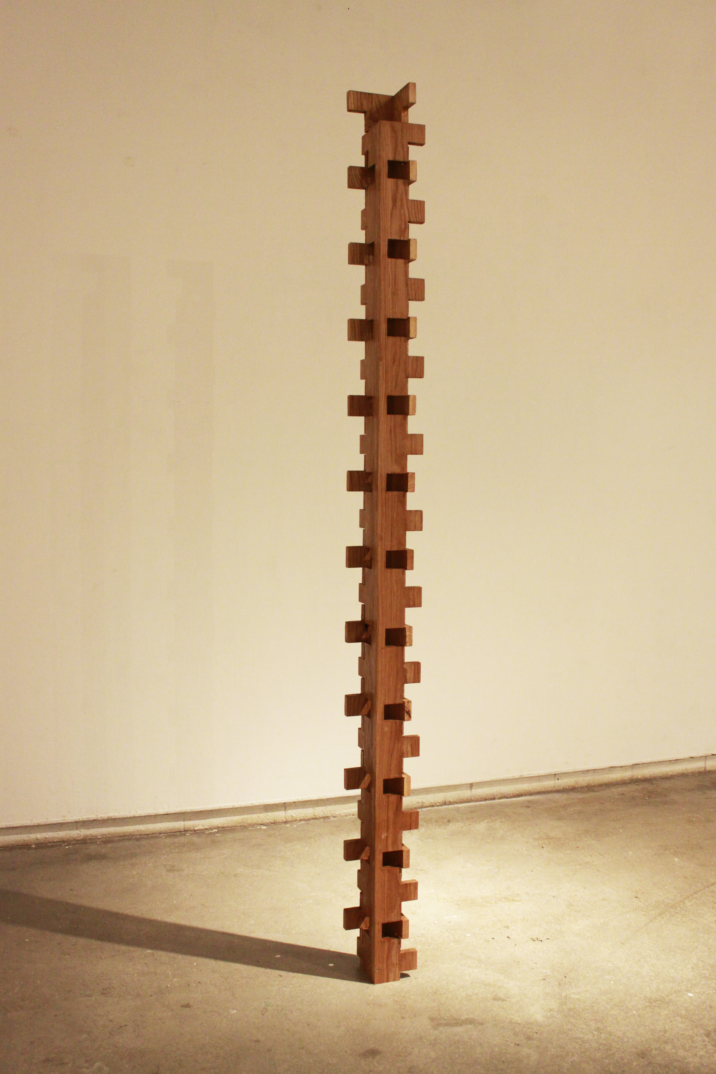  Untitled, 2011, two planks of green teak wood cut and assembled, 8’ x 6.5” x 6.5” 