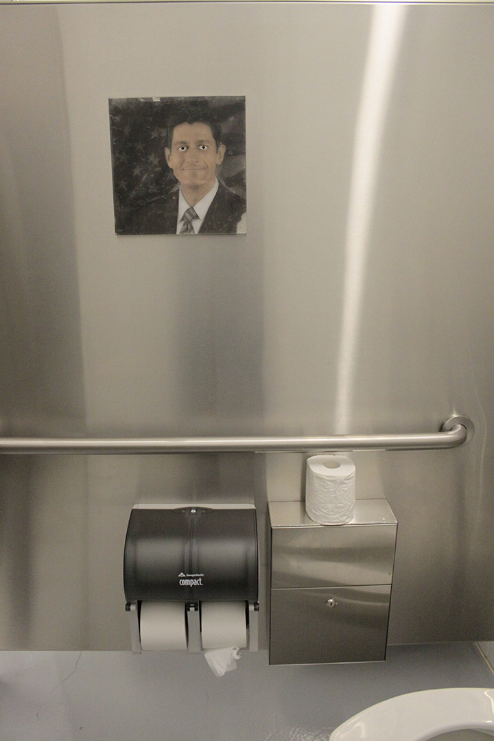  Paul Ryan painting with eyes that follow you by Tim Rietenbach, plaster toilet paper roll by Ryan Agnew 