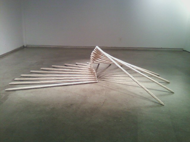  Untitled (stacked dowel jointed spiral), 2011, poplar wood, 3’ x 12’ x 7’  