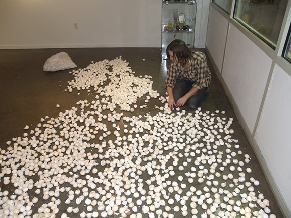  Resonated Detachment, 2006, eggshell installation collaboration with community. Image of installation at Elements of Art Gallery, Columbus, Ohio. Eggshells covered 1,000 square feet of gallery floor.  During this time in my life I felt as though man