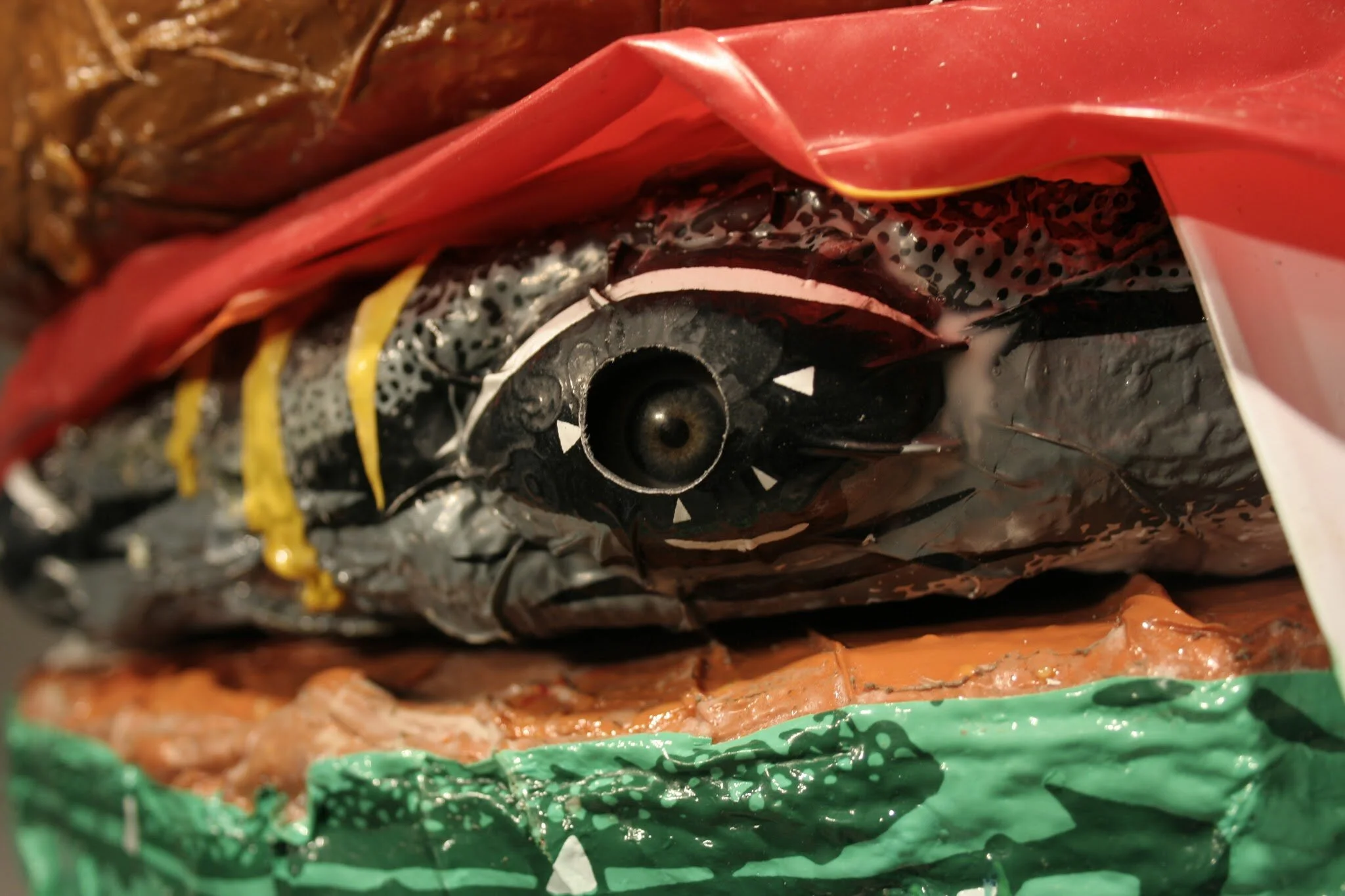  I hid the sculpted human eye sockets behind these coverings as a way to bring people into the space of the sculpture. If you wanted to see these eyes, you can only discover it’s human features by getting very close to it.  