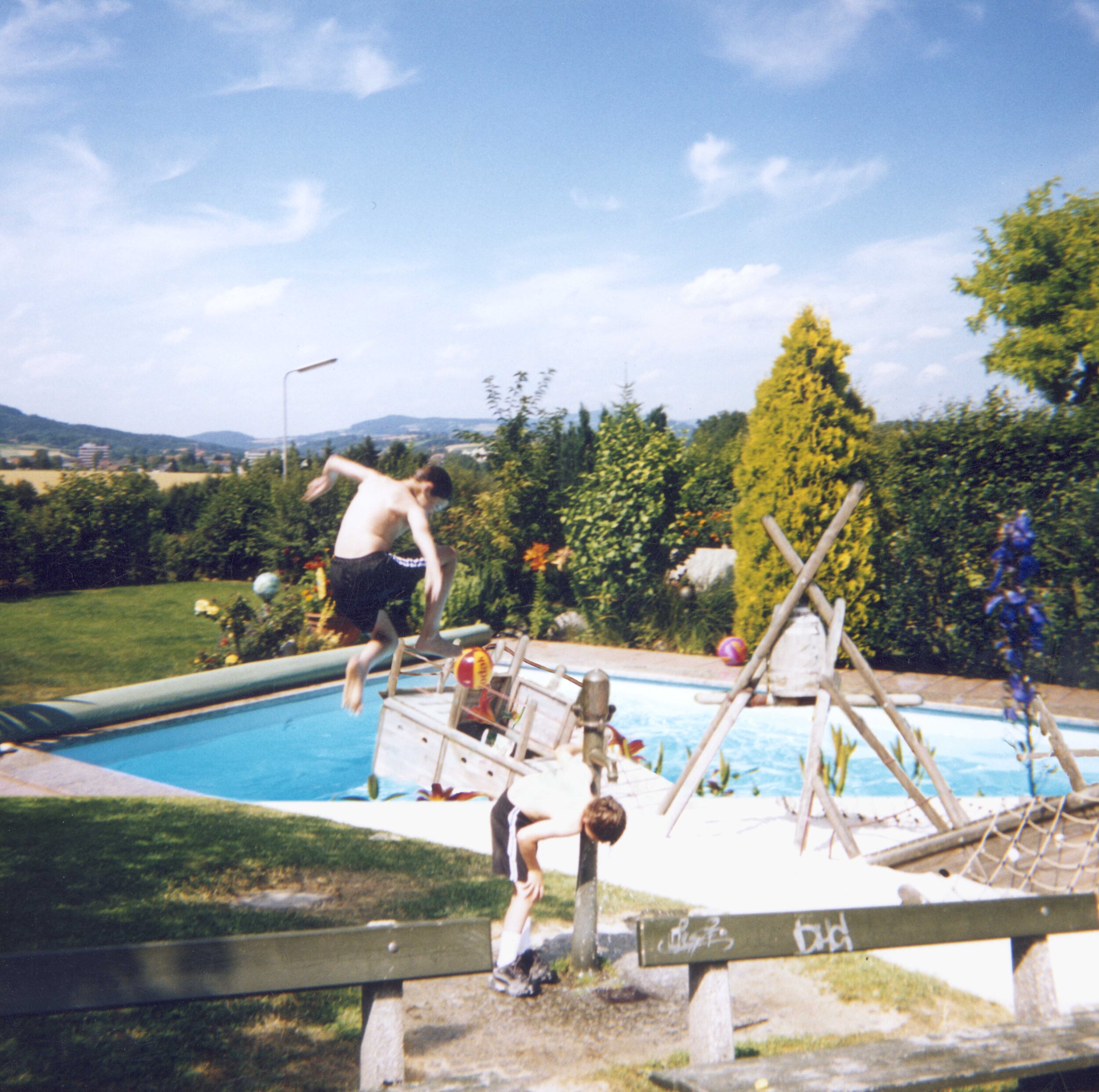 In this collage, I do not attempt to hide the seam. It combines two photographs of the same child in different scenarios; in one he jumps into a pool, in the other he soaks his head under a water pump in a desert island themed park with a sunken shi