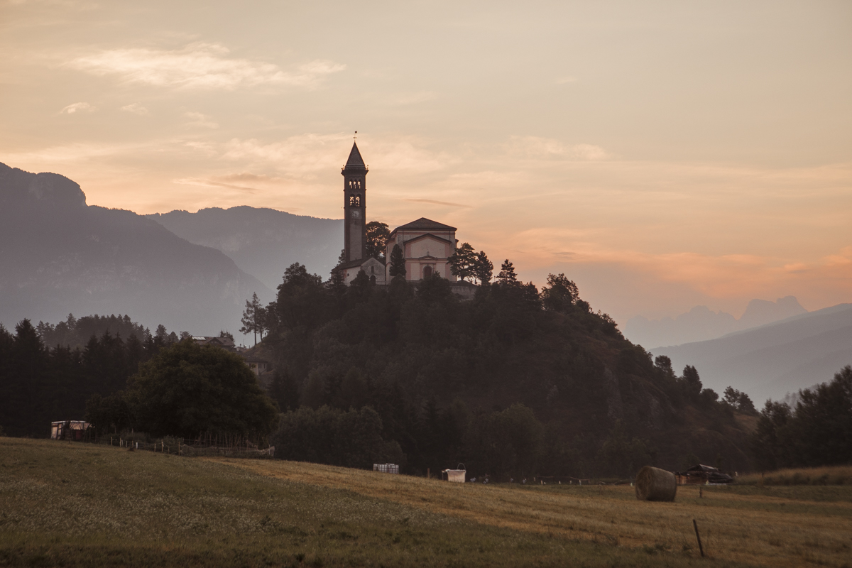 The Church of San Giorgio, located on a hill that dominates the town of Castello-Molina di Fiemme.