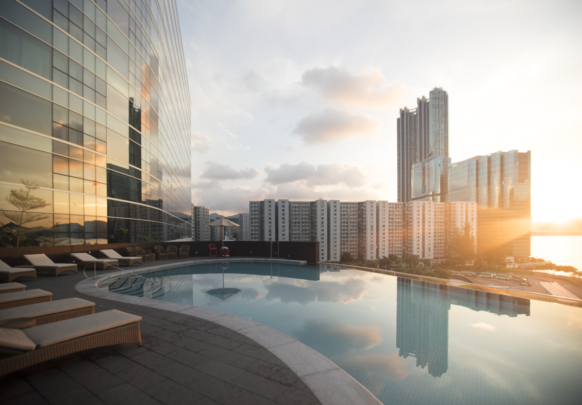 Panoramic window views over the harbour and the infinity pool