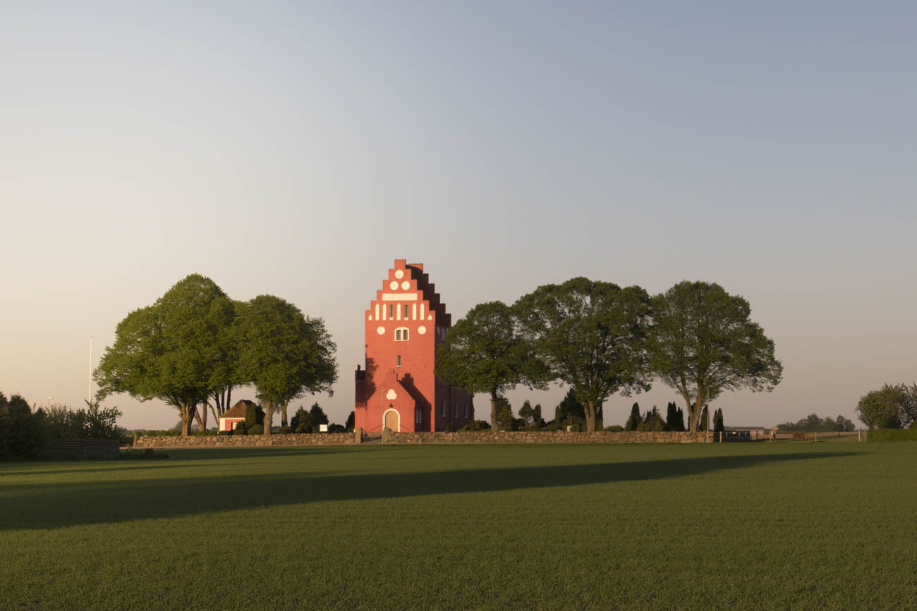 The little church of Falkerslev, one of Falster’s red-painted churches with white covers.