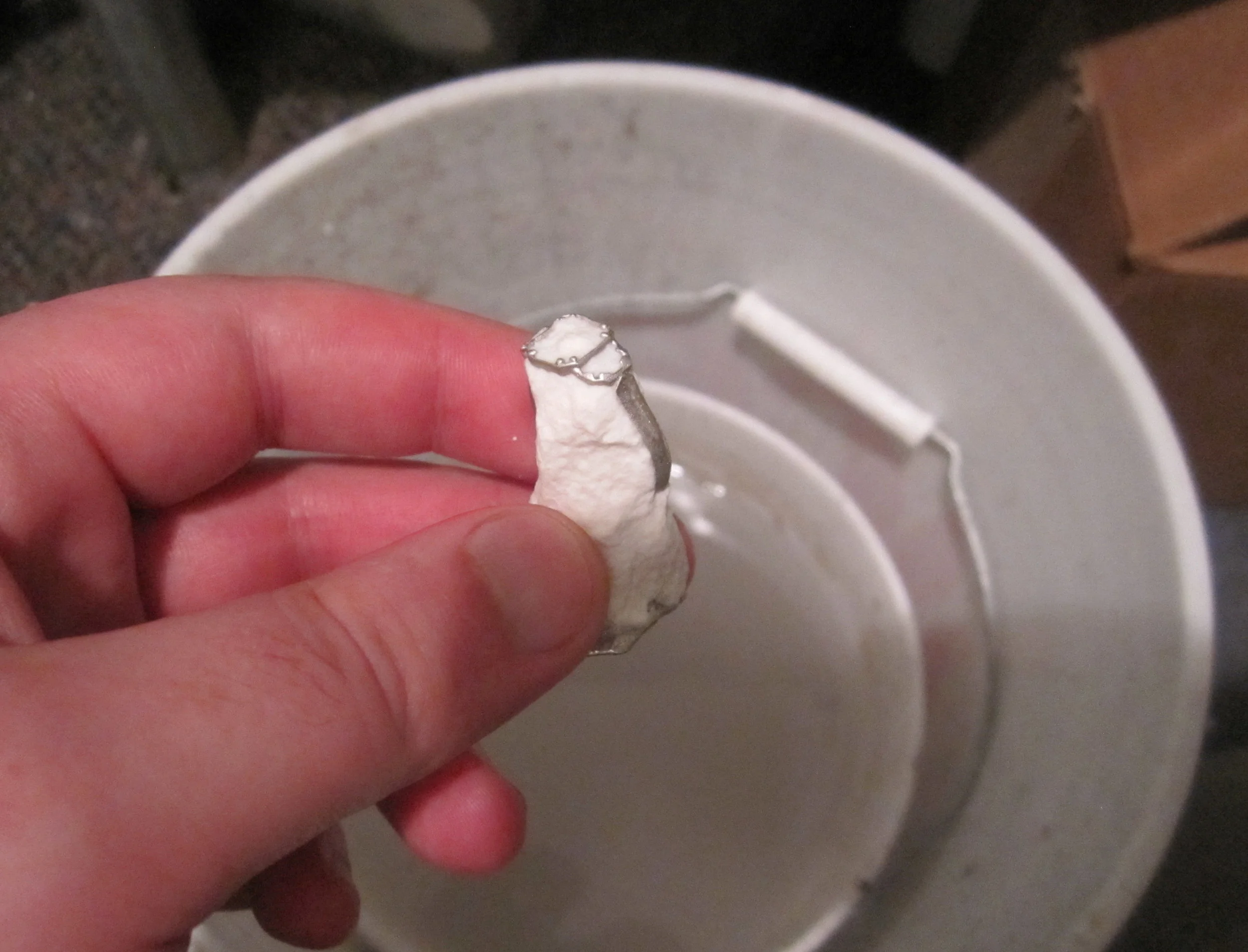 removing investment from casting