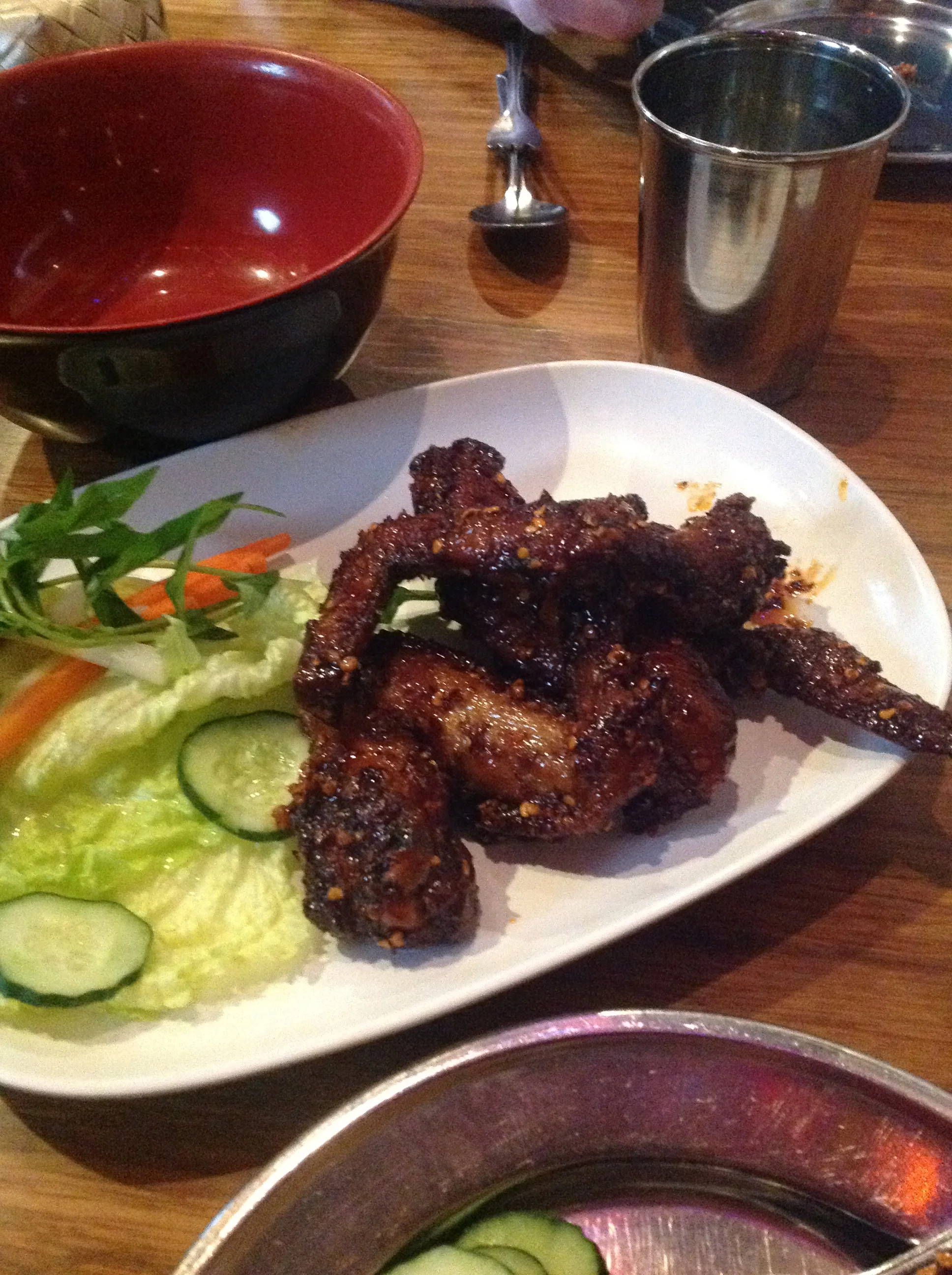 The Vietnamese table salad refreshes the palate between bites of these astonishingly meaty, salty and sweet wings.