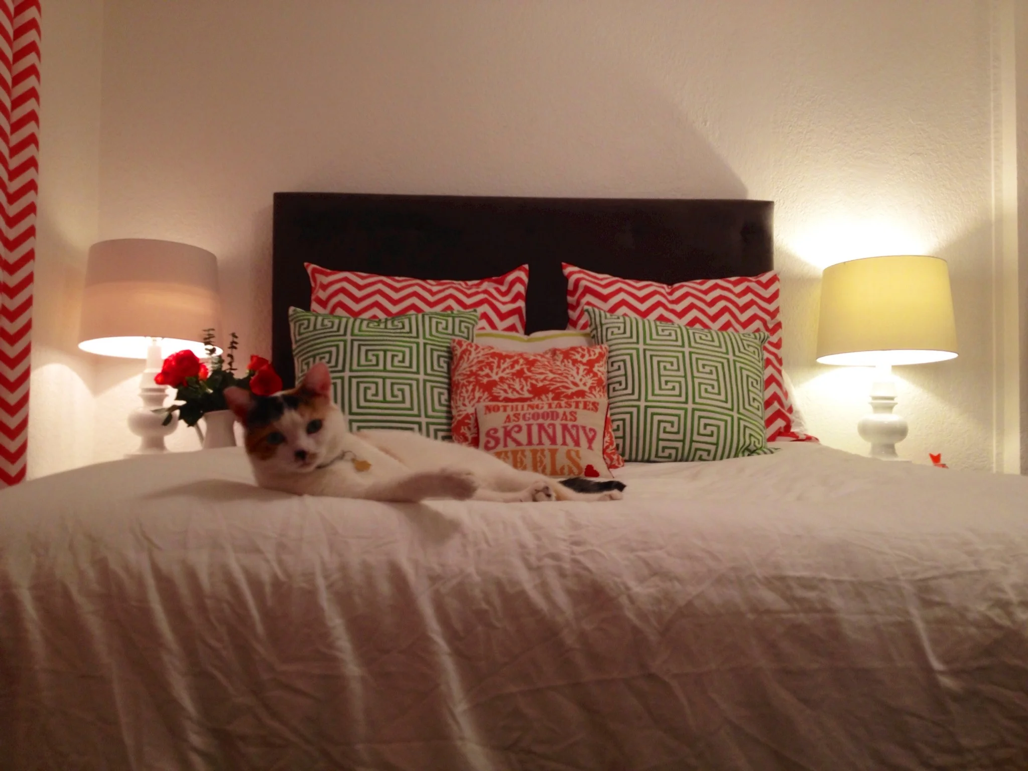 In this setting, the silliness of the pillow is balanced by purposeful, symmetrical use of graphic prints. The result is polished, yet fun at the same time. 