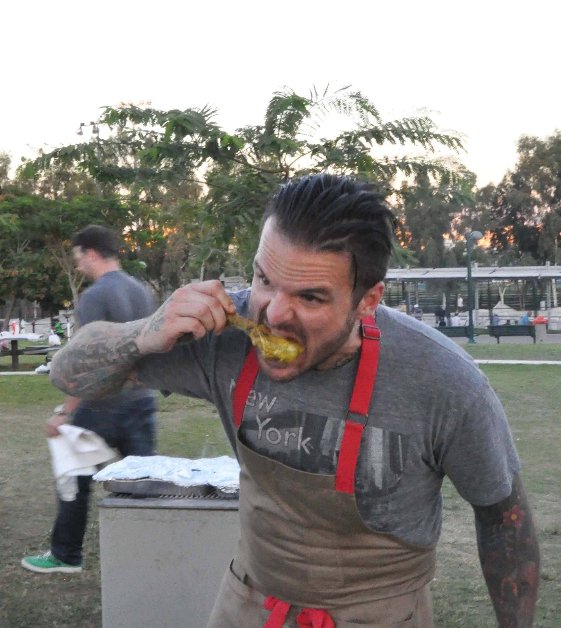 Chef Nate Appleman chowing down on a joint creation with Chef Mourad Lahlou in Israel 