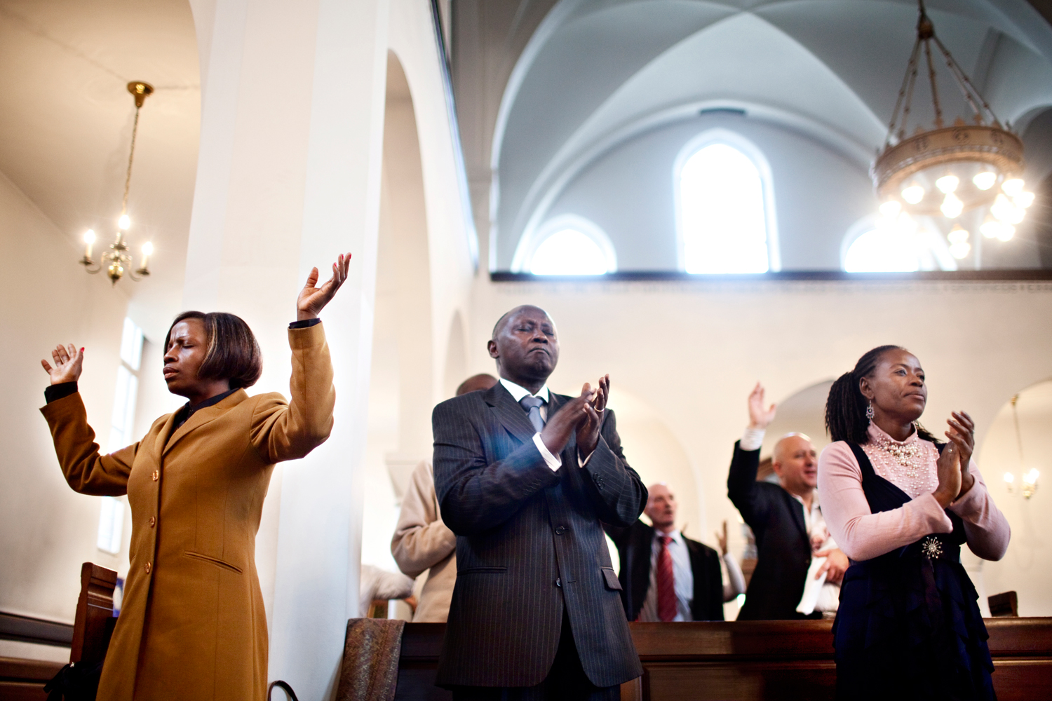  Love for God.  'Church on the rock' gathers Christians from different parts of Africa in church of Timotheus in Copenhagen, Denmark.   