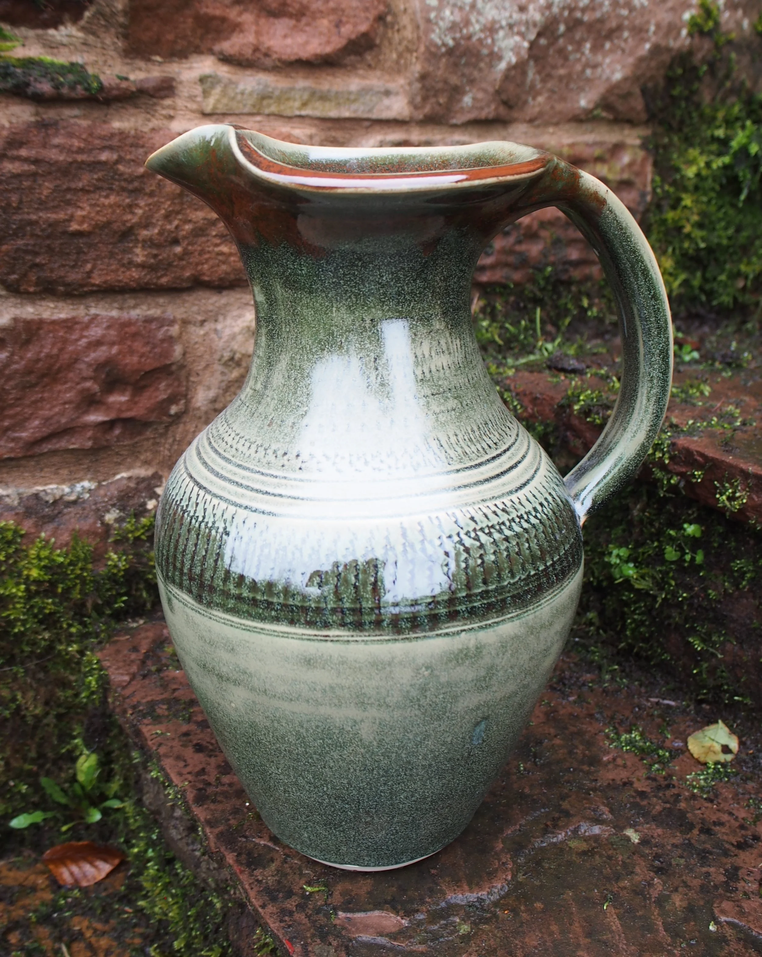 31 x 18 cms. A large jug; speckled green and sienna £75.00