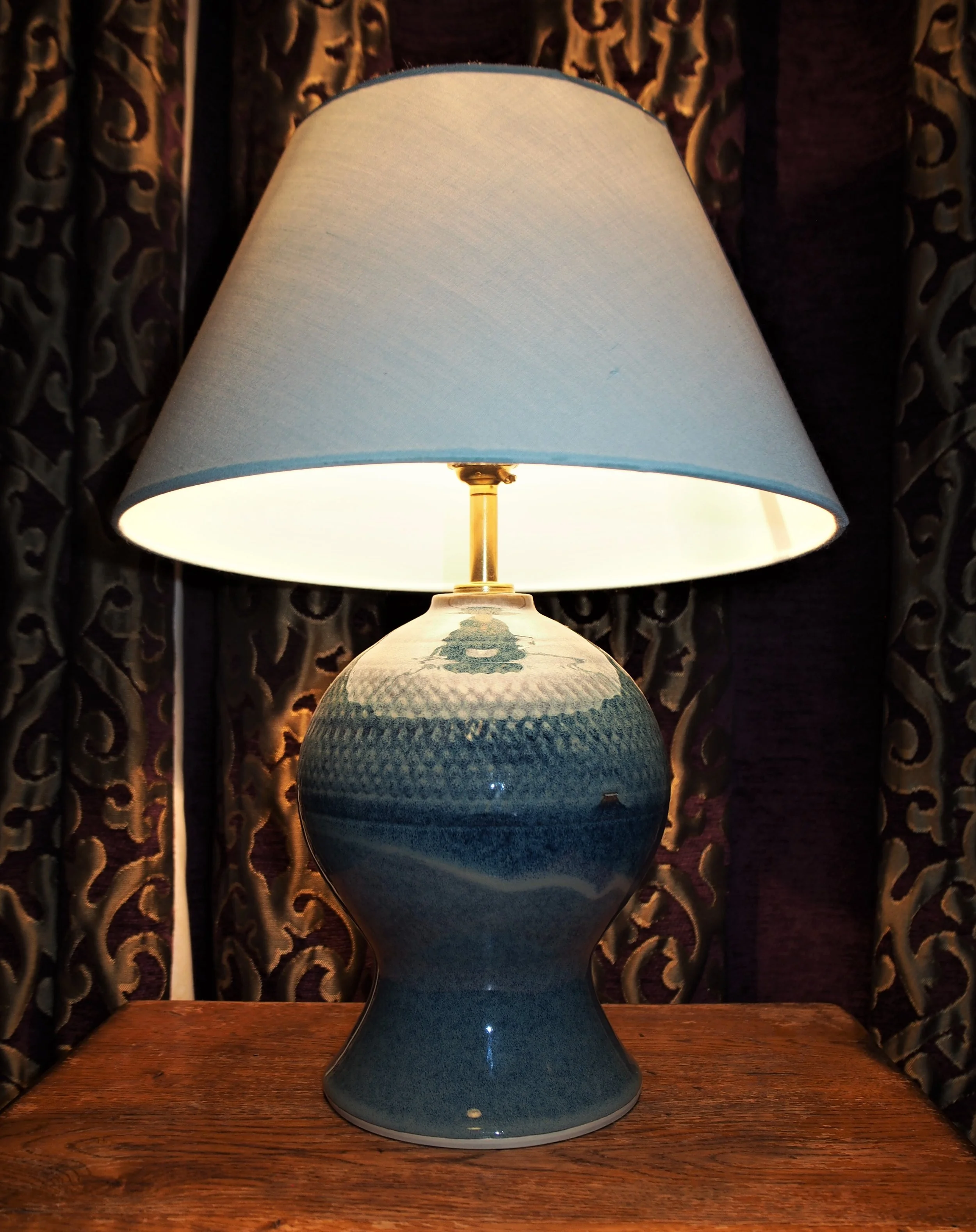 22 cms high, smoky blue. £70