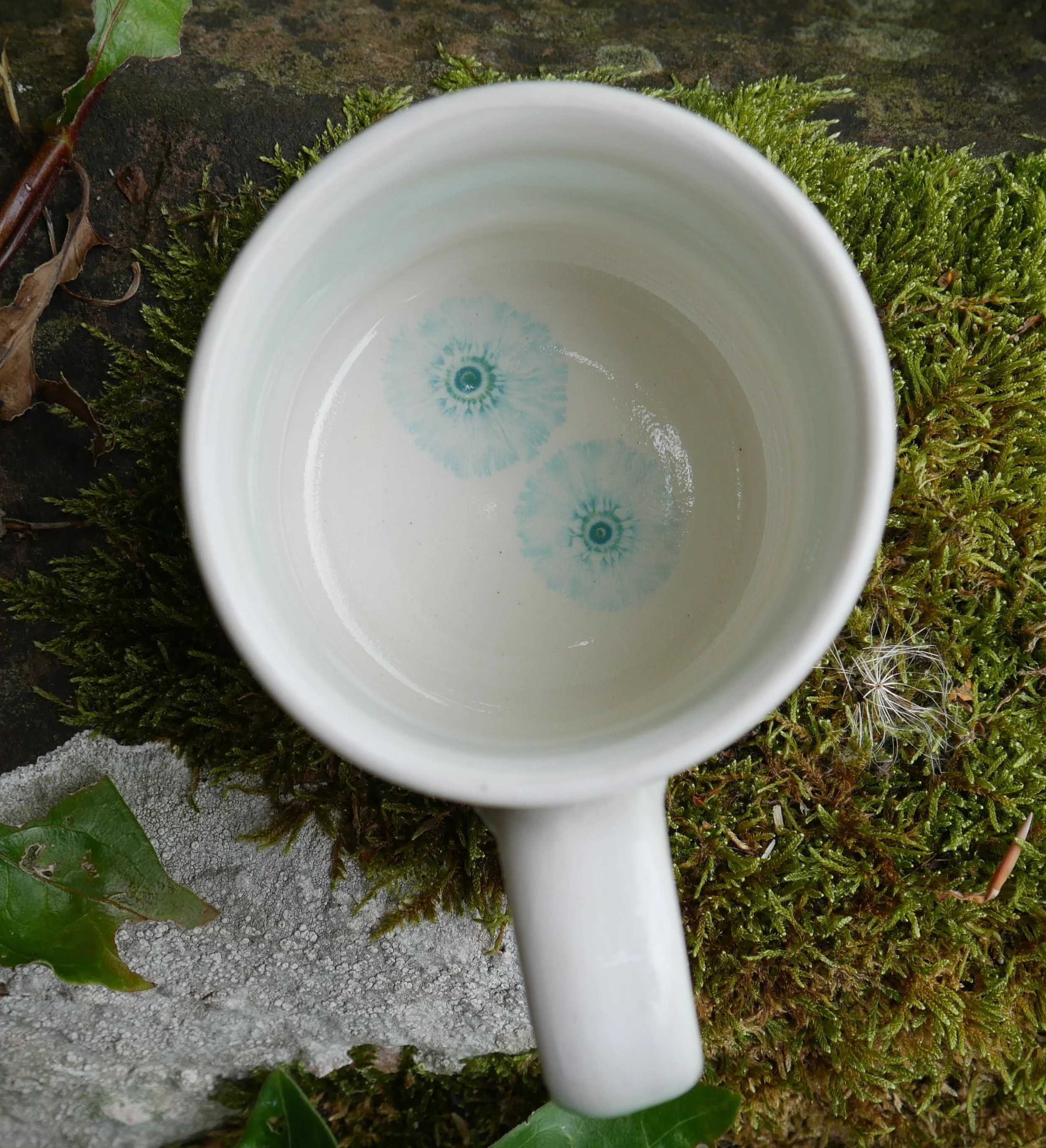   Green/oatmeal mug: inside detail...mocha diffusion effect  
