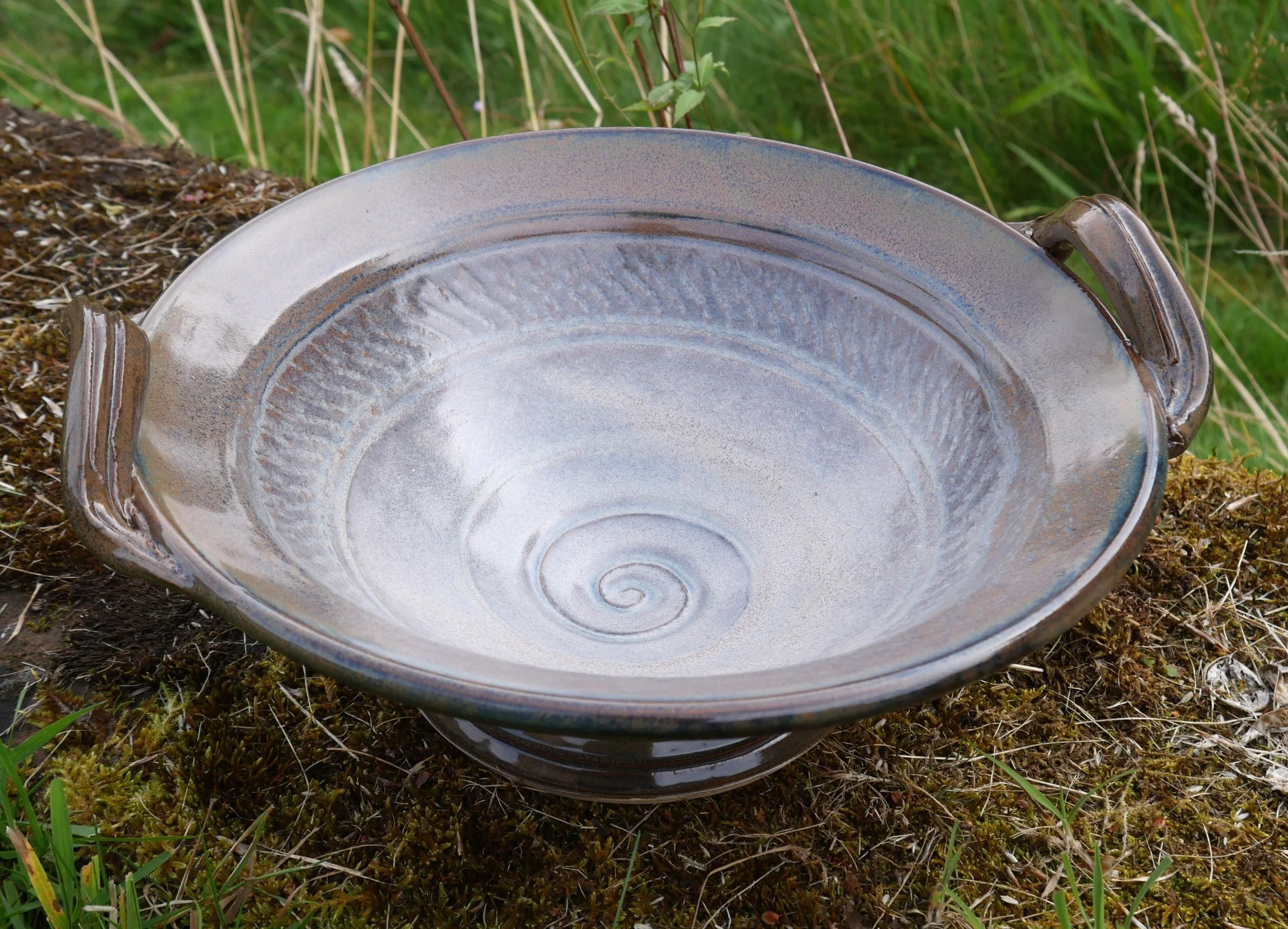 Sea Magic glaze, handled, raised footring. 29 x 10 cms £85.00