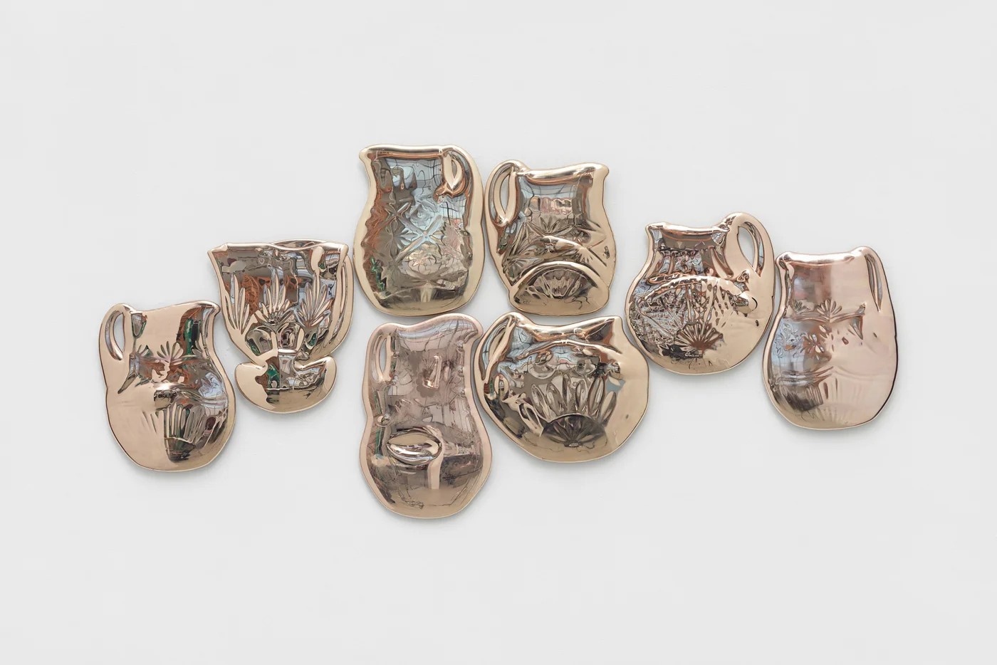 Amassment, 8 melted lead crystal pitchers coated with silver nitrate. 2017. Photo credit: John Janca