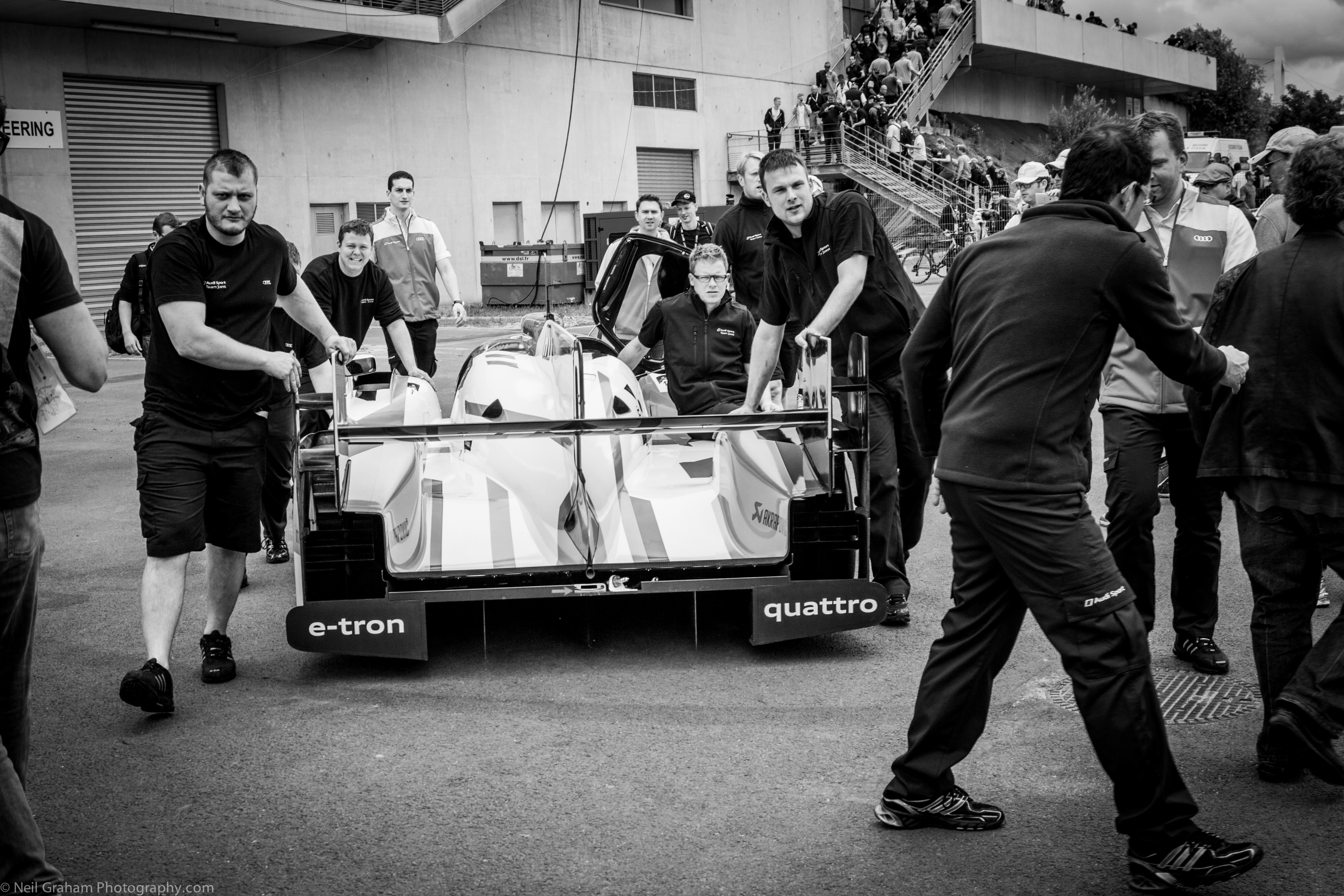 Number 2 Audi being pushed from the race judges