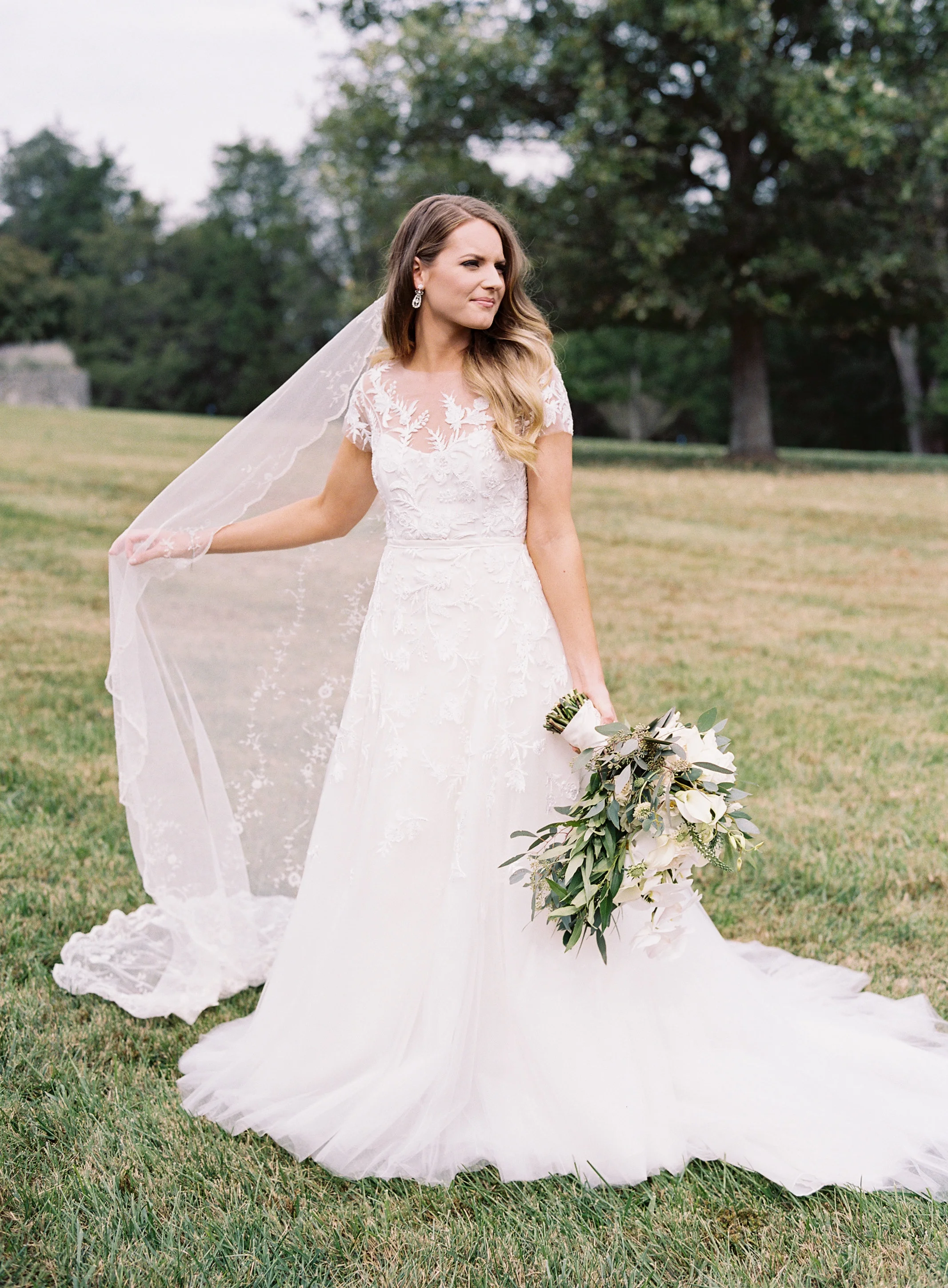 Caroline and Derek's wedding was planned and designed by Big Events Wedding in Nashville, TN. The beautiful bride is pictured on her wedding day.