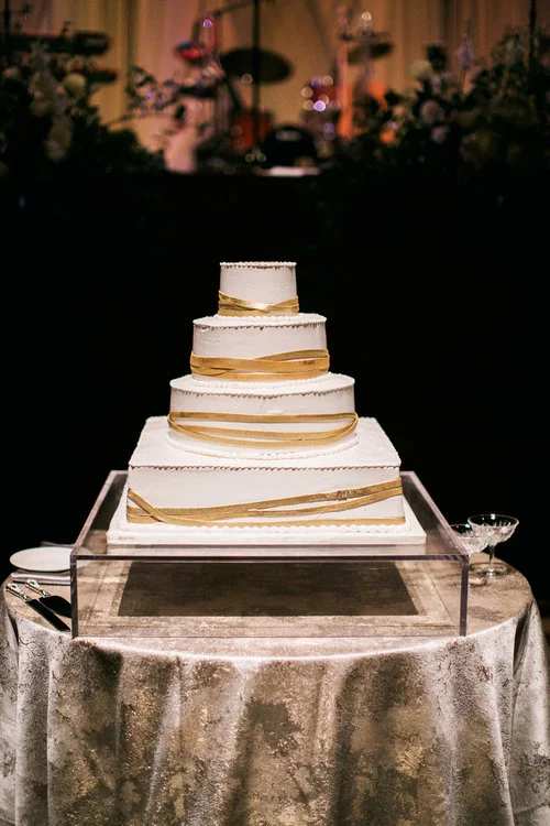 The Brown's gorgeous wedding cake awaits cutting at their elegant wedding reception at Schermerhorn Symphony Center in Nashville, TN. Wedding planning &amp; design by Big Events Wedding.