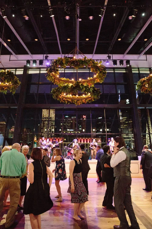 The guests dancing at the Ralls wedding reception at the Country Music Hall of Fame. Wedding planning &amp; design by Big Events Wedding.
