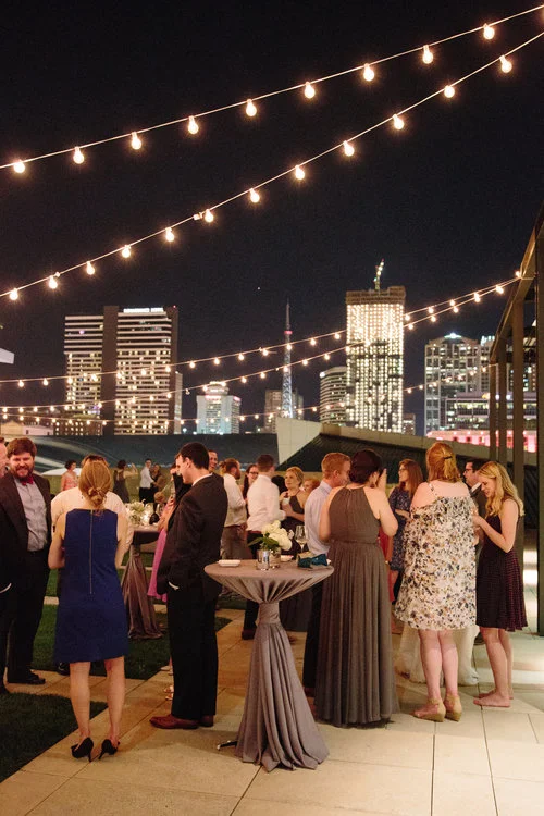 Guests enjoy the view of downtown Nashville at this Country Music Hall of Fame wedding reception. Wedding planning &amp; design by Big Events Wedding.