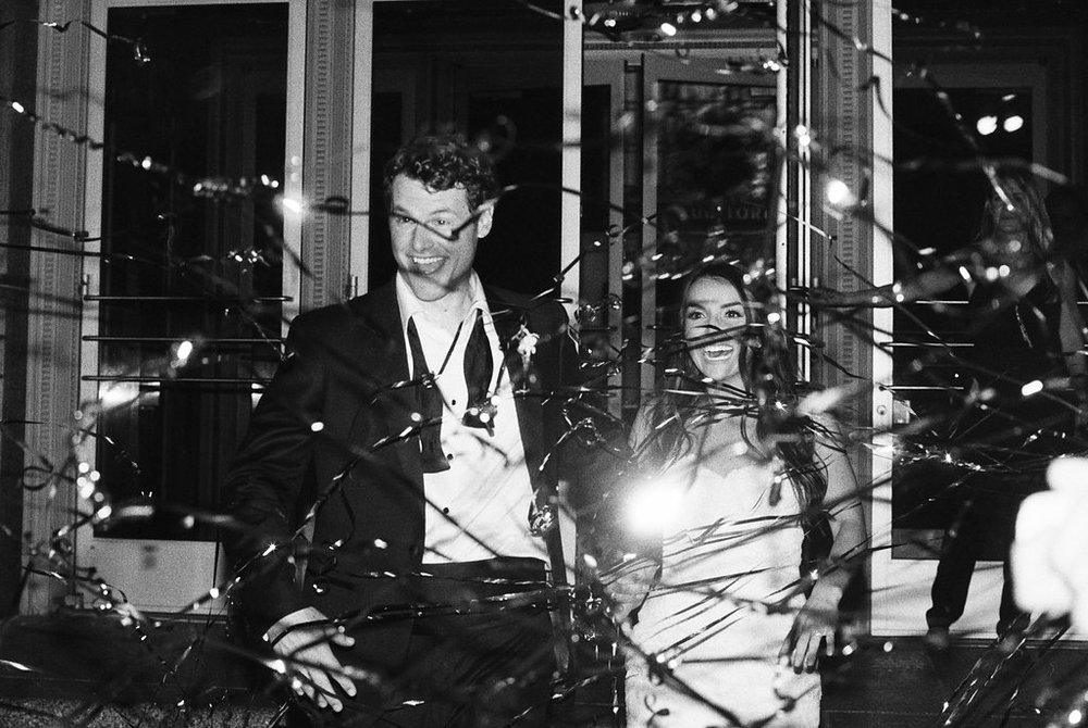 The newlyweds getting the star treatment after their wedding reception at the Frist Center for the Visual Arts in Nashville, TN. Wedding planning &amp; design by Big Events Wedding.