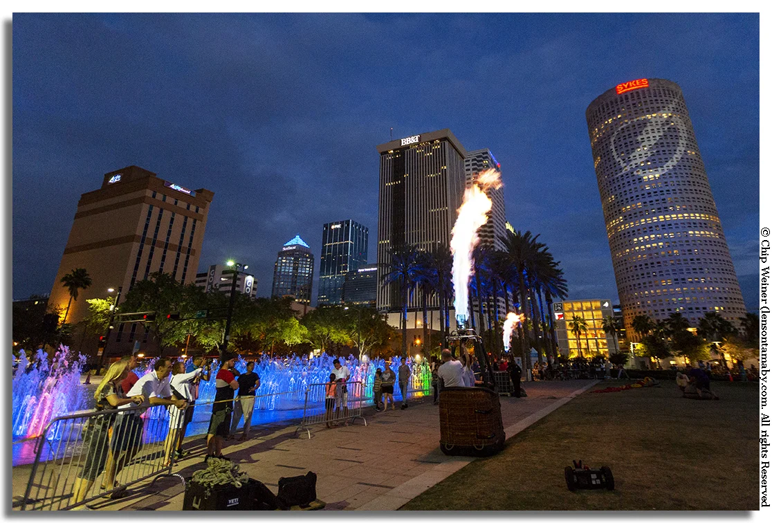 Even though their aircraft were grounded, pilots of hot air balloons gassed the burners creating a dramatic site (and some fairly intense heat). Check out the Lightning logo on the Rivergate building!