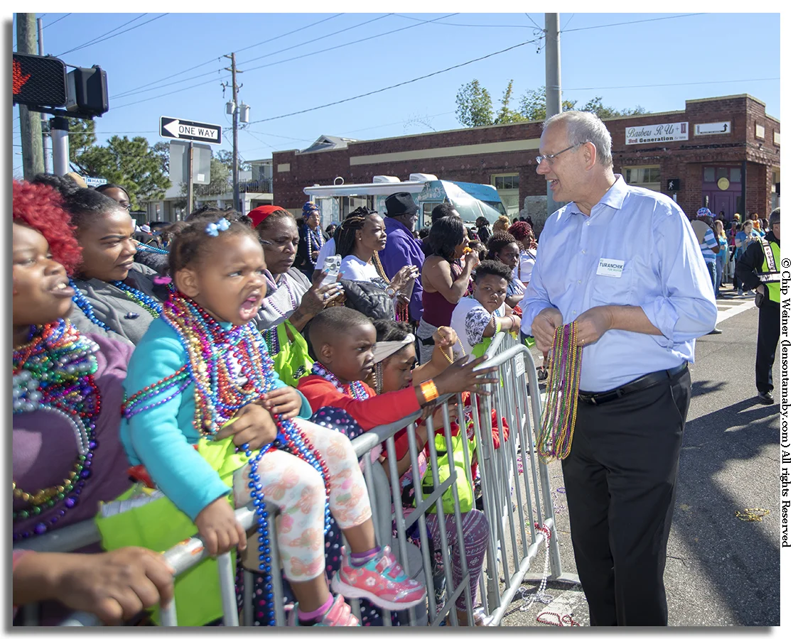 Ed Turanchik works the crowd of potential and future voters as a candidate for mayor