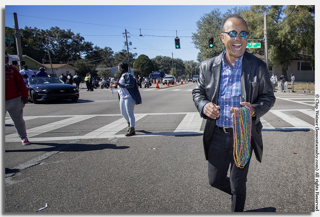 Reginald Roundtree, WTSP news anchor, smiling big at the Tampa MLK parade