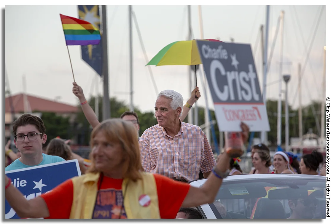 United States Congressman Charlie Crist is in attendance along with a strong contingent of Crist sign carriers.