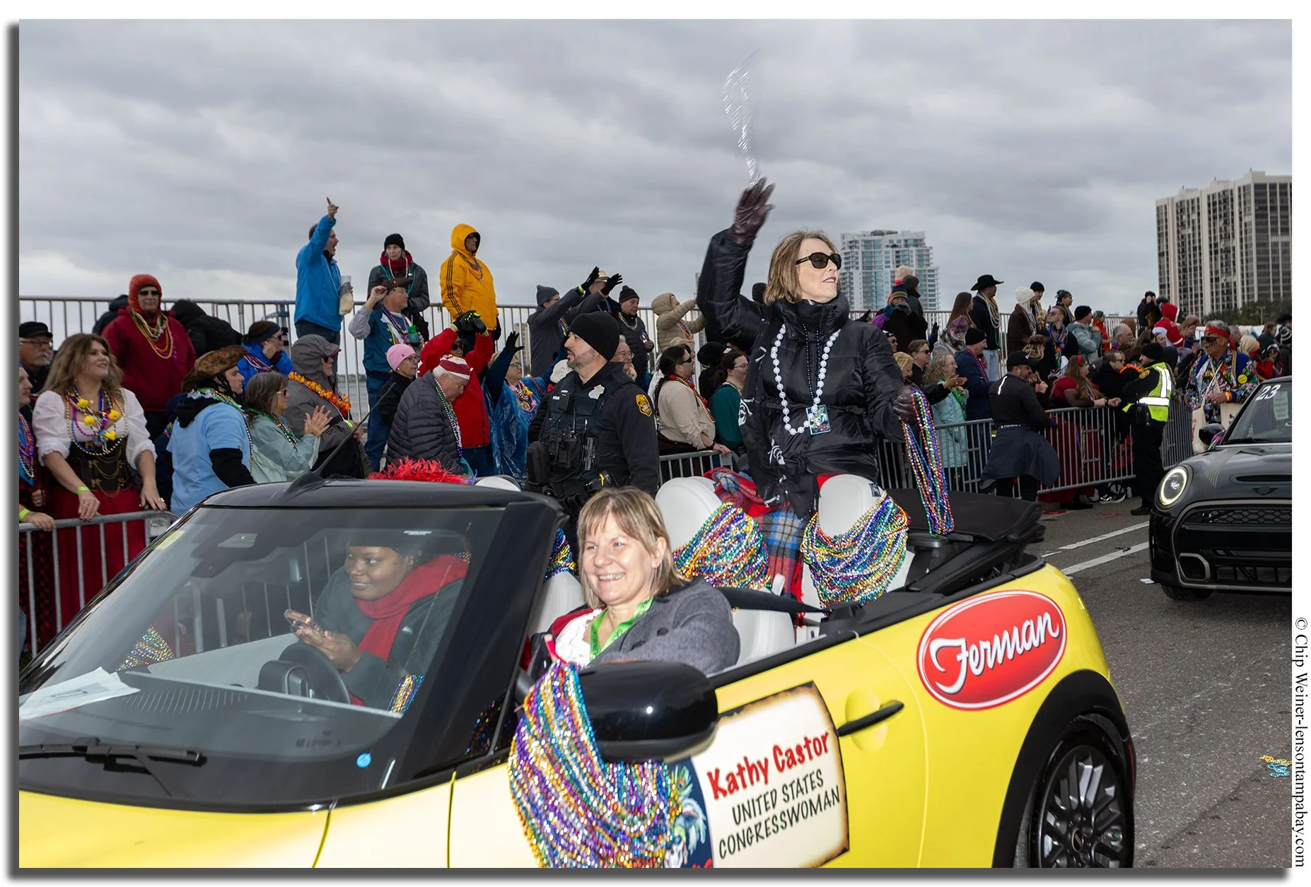Kathy Castor participating in the Gasparilla Parade in Tampa, waving to crowds and celebrating the community festival.