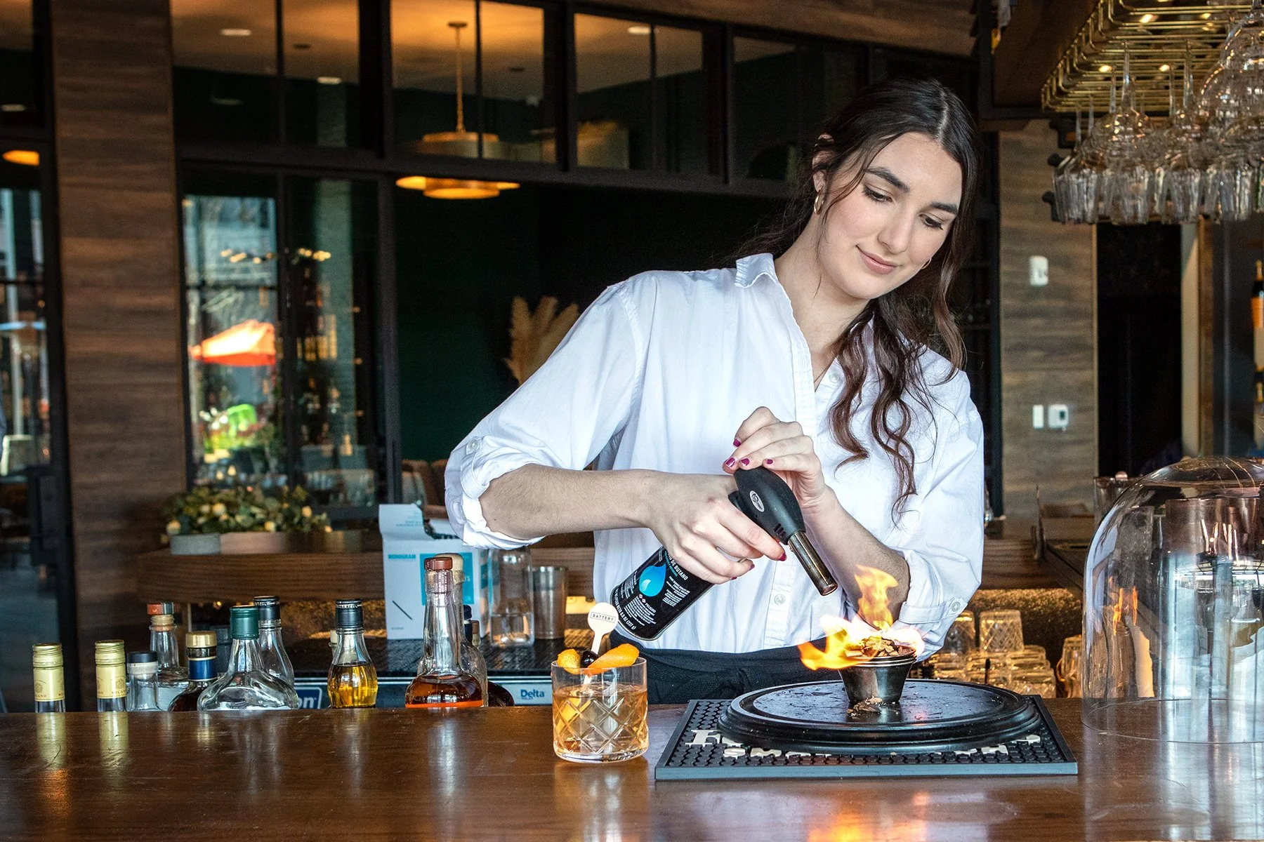 Sever Devyn prepares an Old Friend, Battery's version of an Old Fashion.jpg