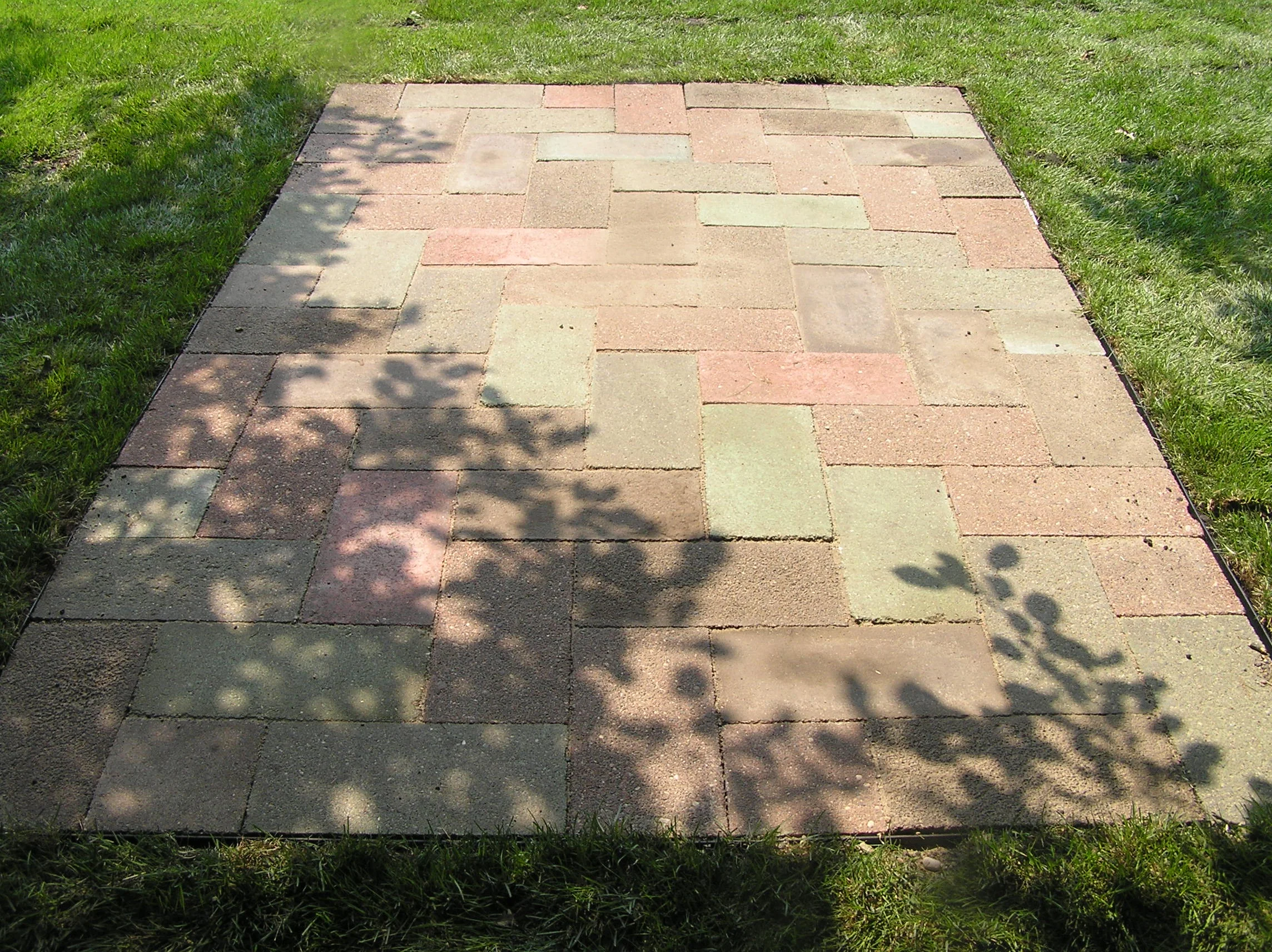 Flagstone vs Stamped Concrete vs Patio Blocks vs Wood Patios