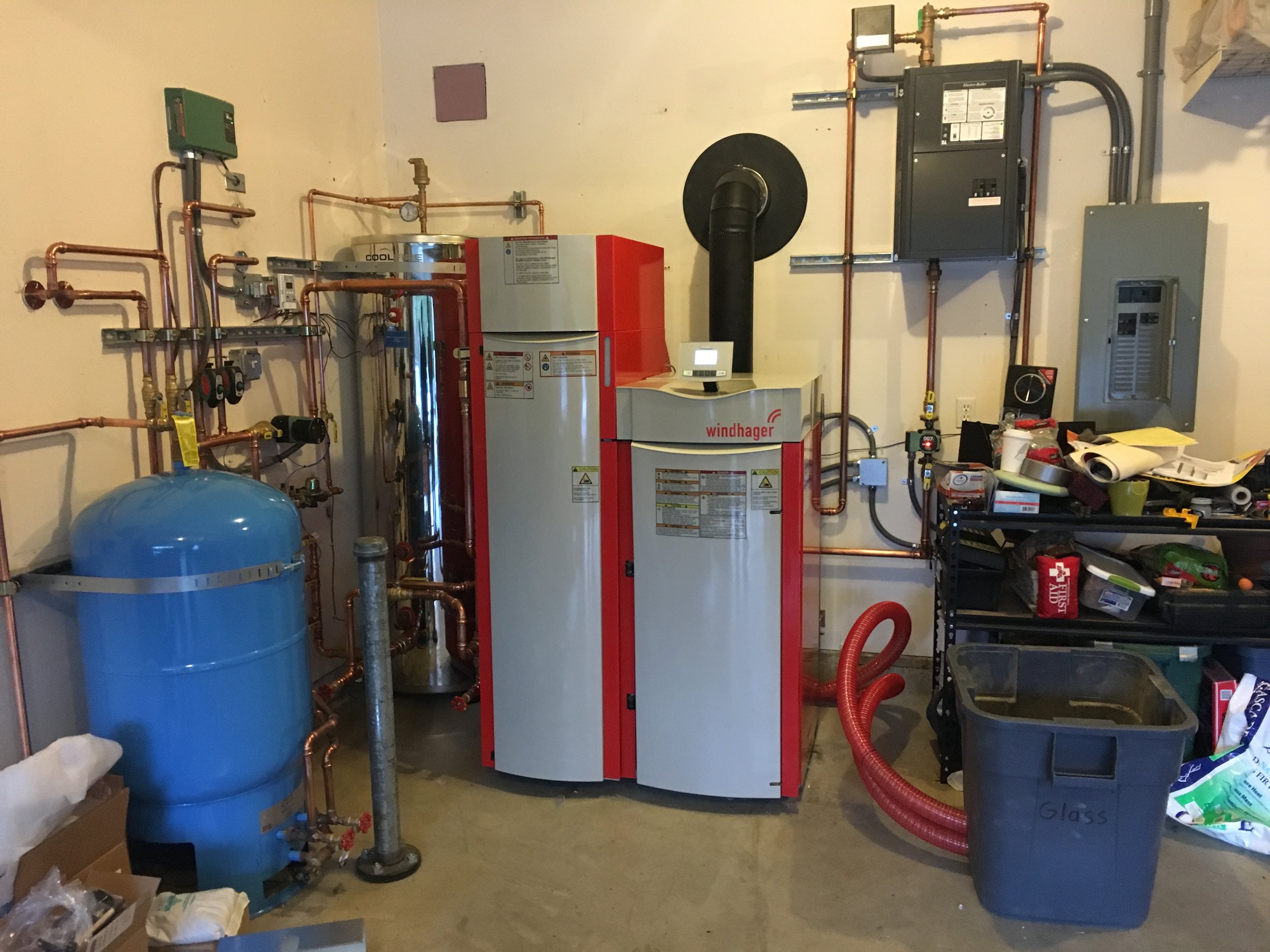 This is the newest biomass boiler in Juneau, Alaska - a small (50,000 btu/hr) Windhager pellet boiler heating a family home. Wisewood Energy procured the boiler and assisted with design and commissioning.