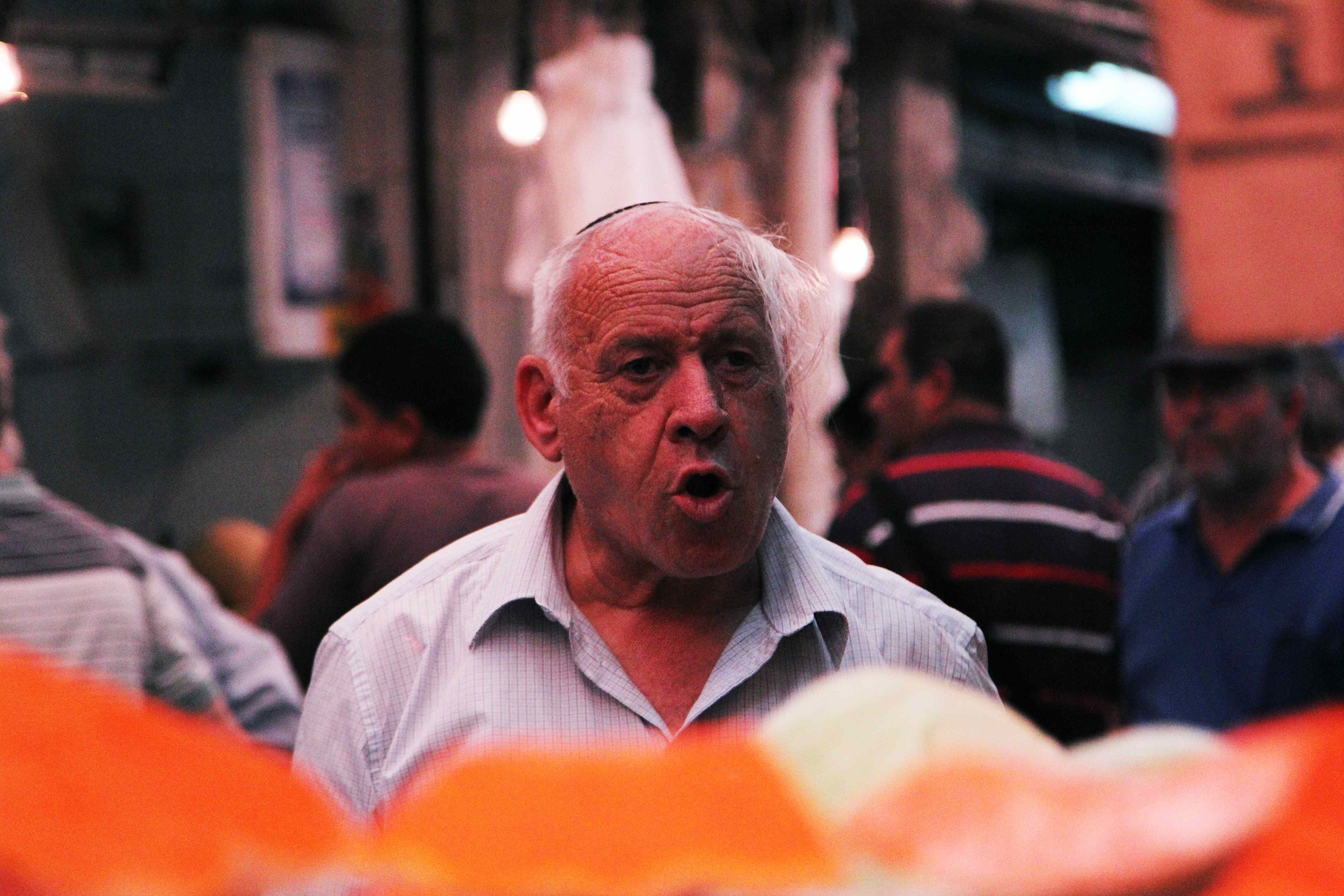 Man shouting in market.jpg