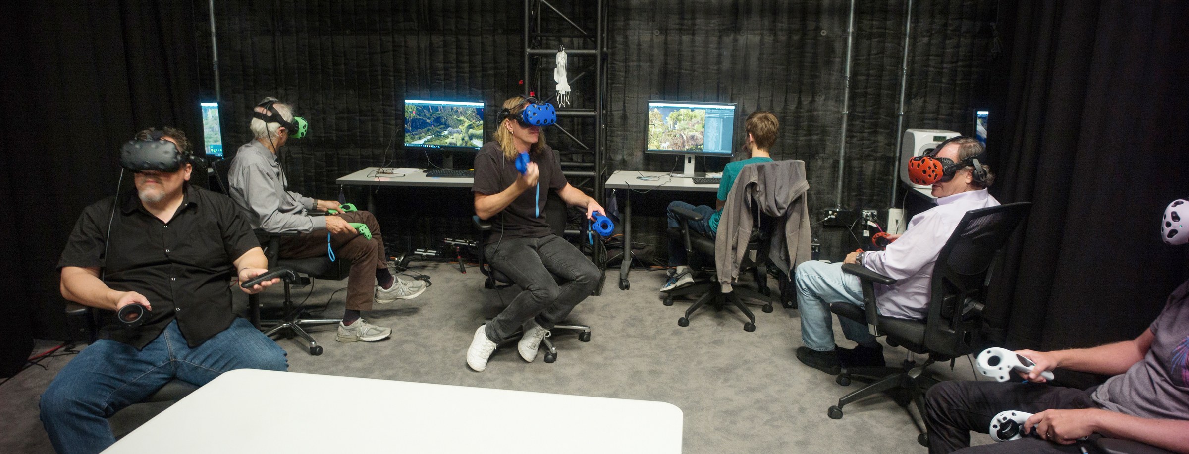 Favreau, Caleb Deschanel (ASC), Rob Legato, and crew scouting locations on the virtual set.