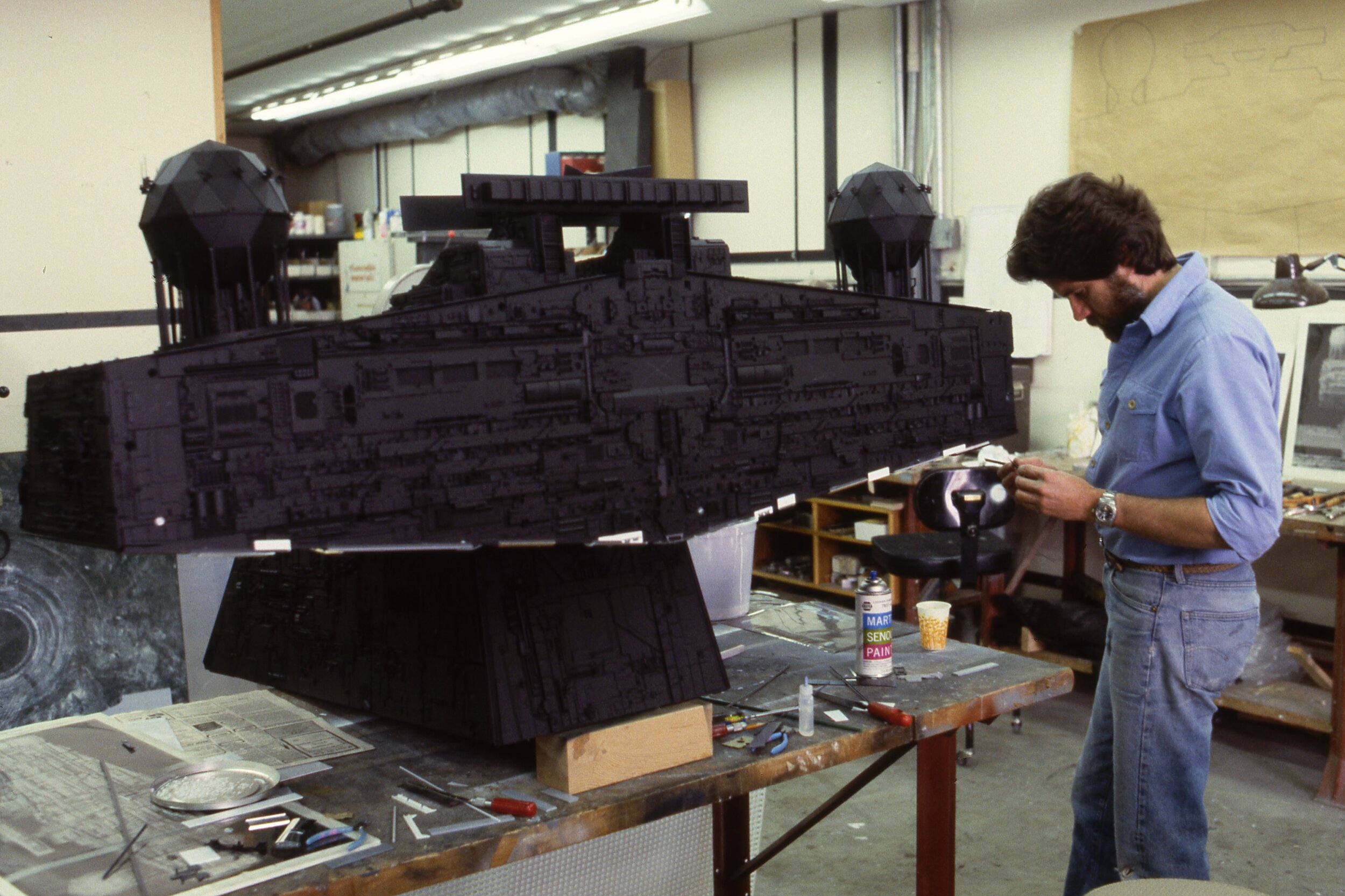  Jeff working in the model shop on a detailed model of a star destroyer bridge for Return of the Jedi. 