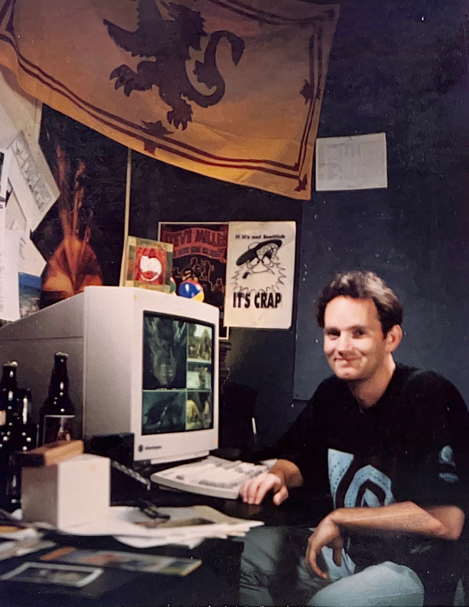  Euan in a pub still at his desk. 