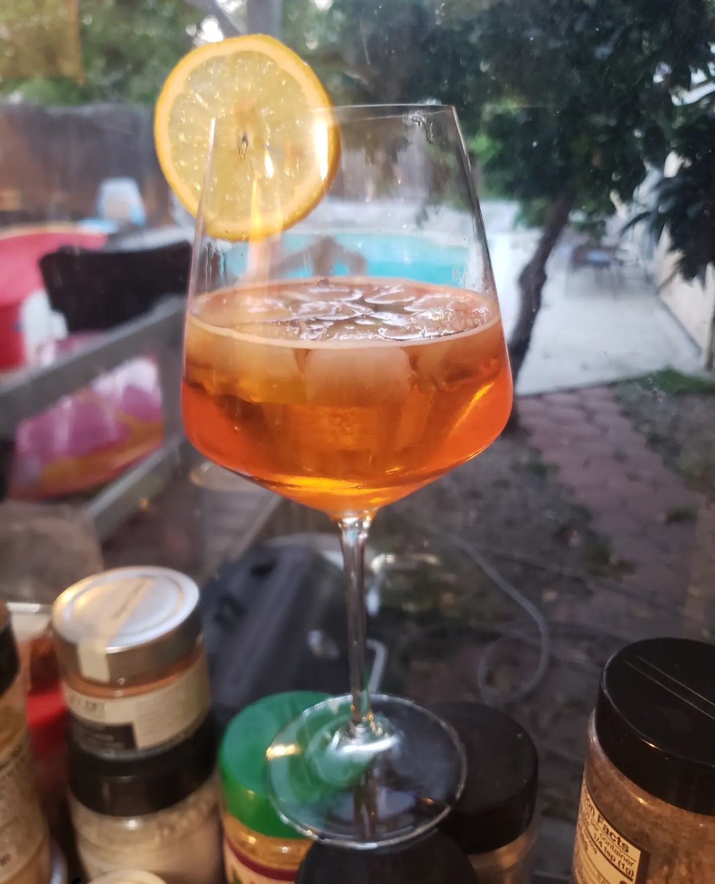 It's aperitivo time... With an Italian Version of a michelada... Peroni Beer, Aperol and lemon