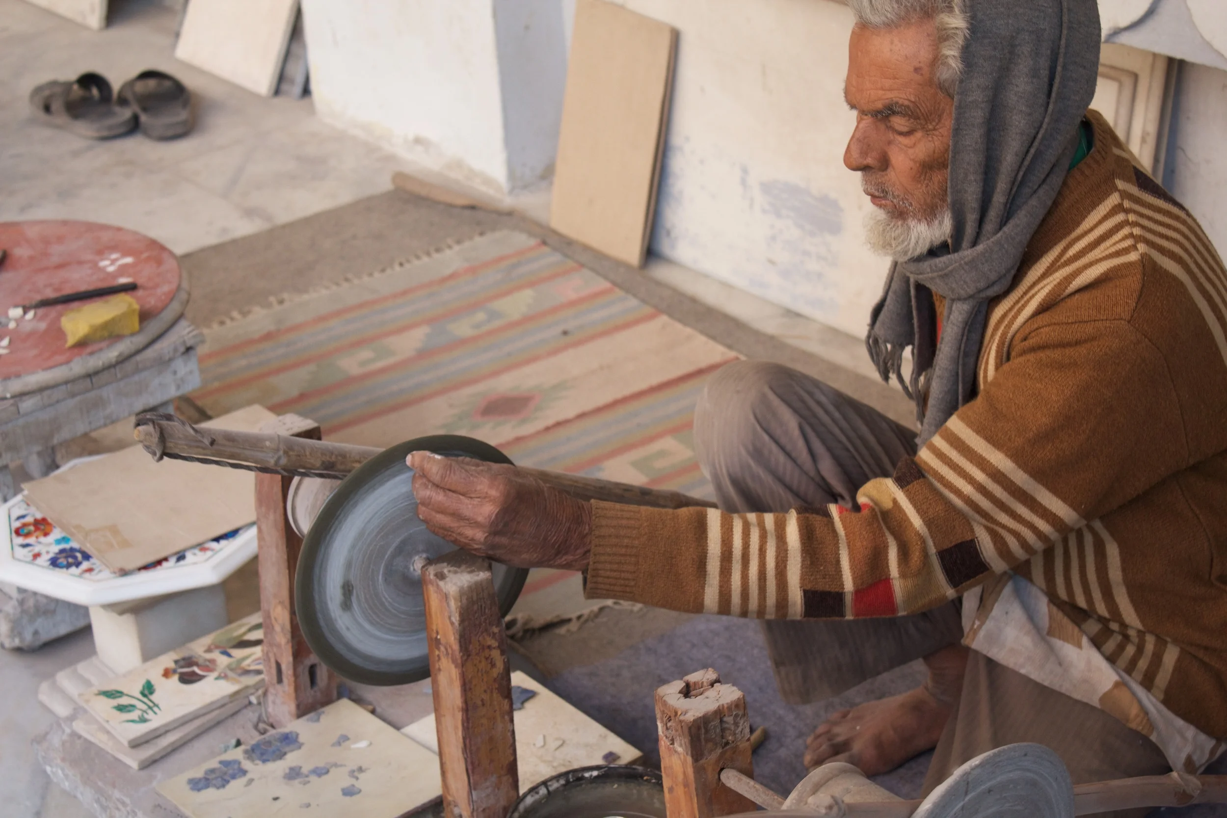 the stone shop out tour guide took us to shop at and where they showed us how they inlaid the stones....